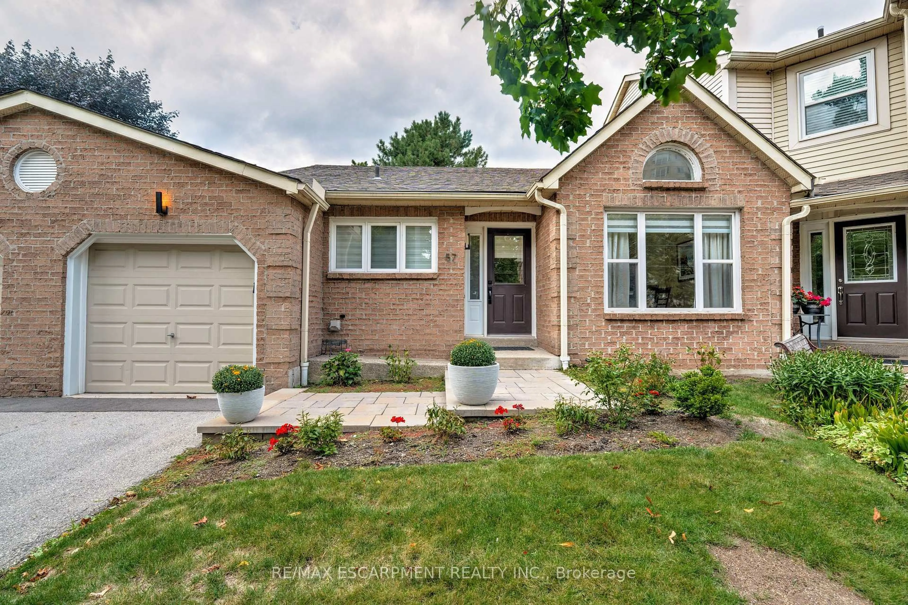 Home with brick exterior material, street for 5255 Lakeshore Rd #57, Burlington Ontario L7L 5X9