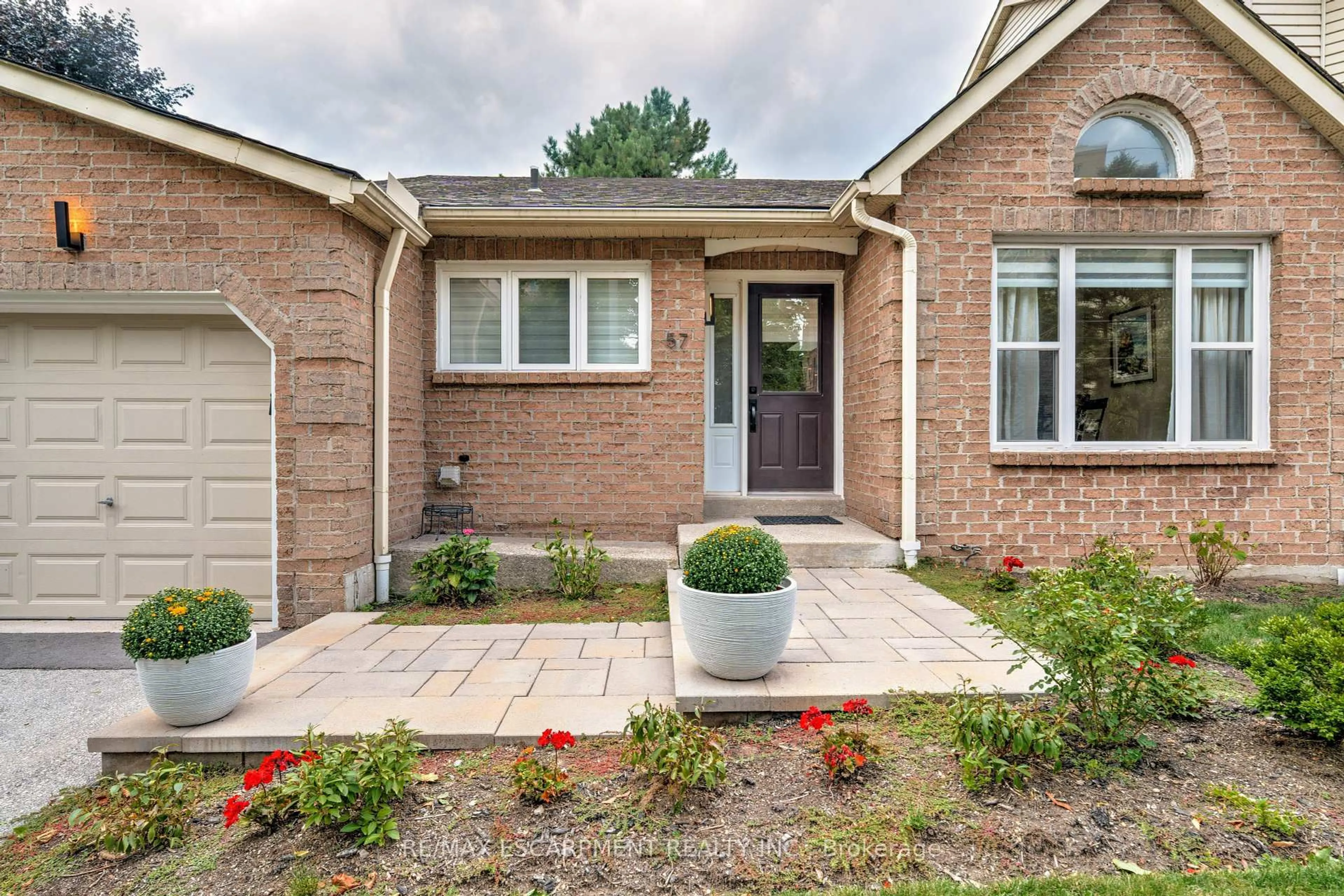 Home with brick exterior material, street for 5255 Lakeshore Rd #57, Burlington Ontario L7L 5X9