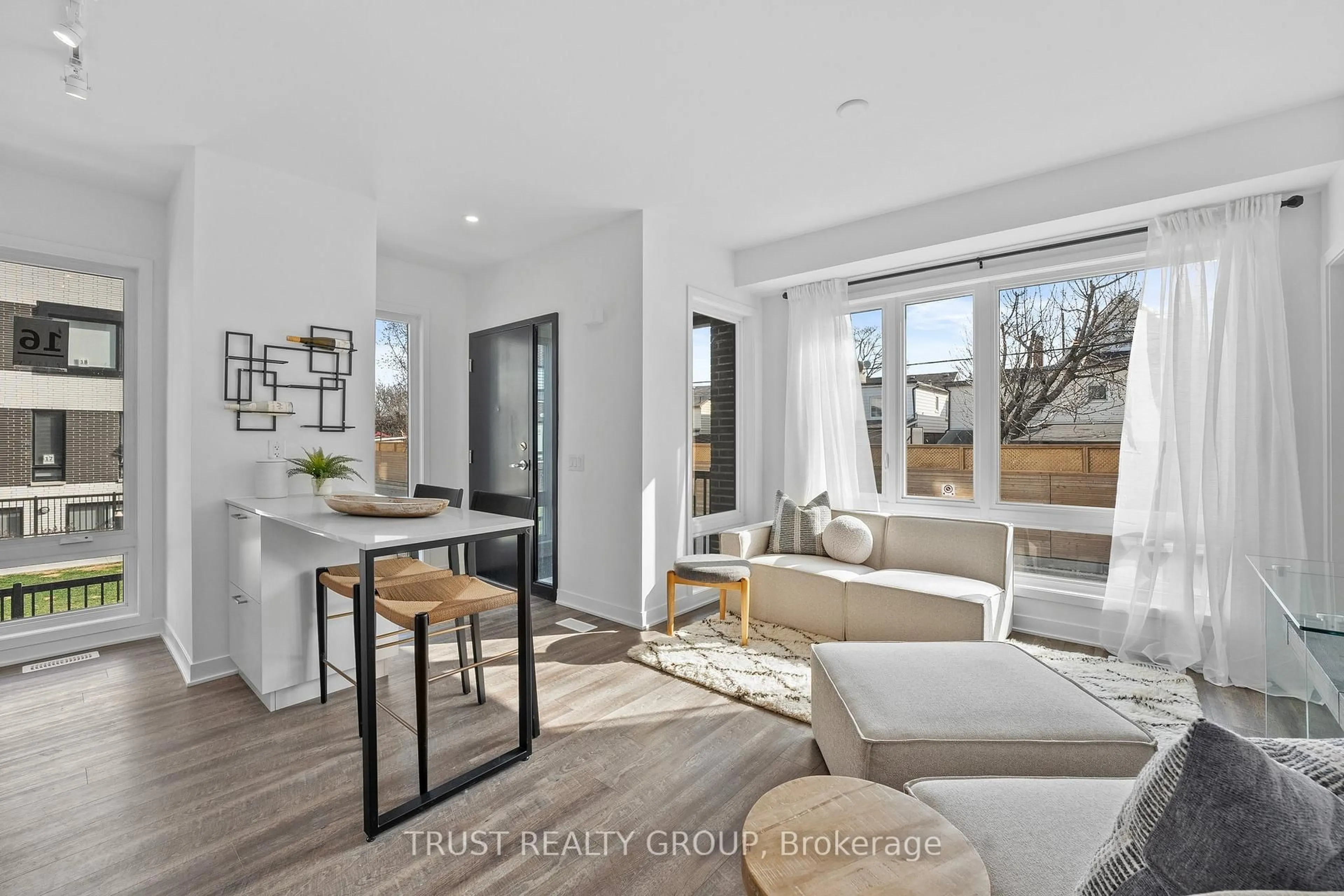 Living room with furniture, unknown for 10 Ed Clark Gdns #TH16, Toronto Ontario M6N 0C1