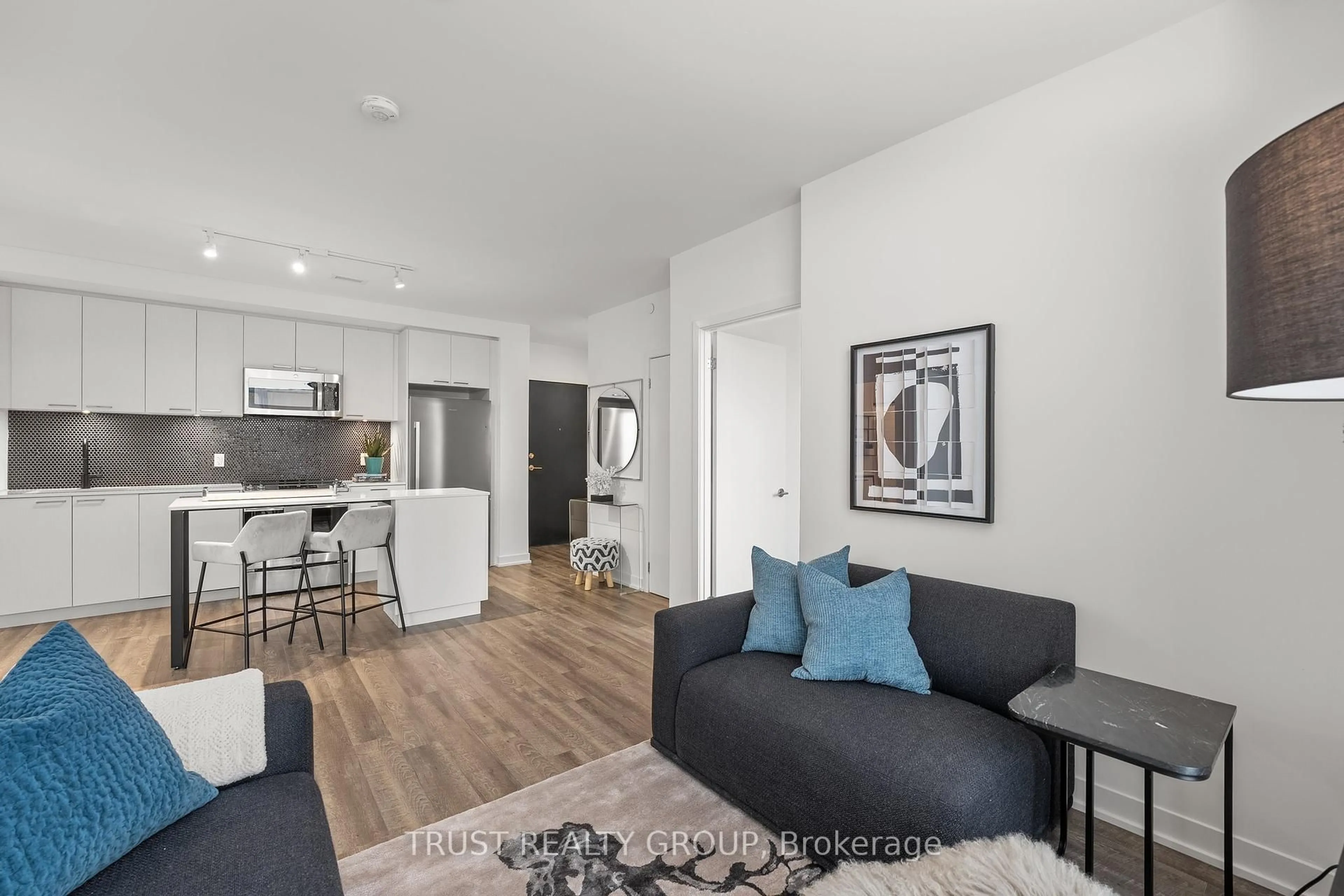 Living room with furniture, unknown for 1808 St. Clair Ave #1102, Toronto Ontario M6N 0C1