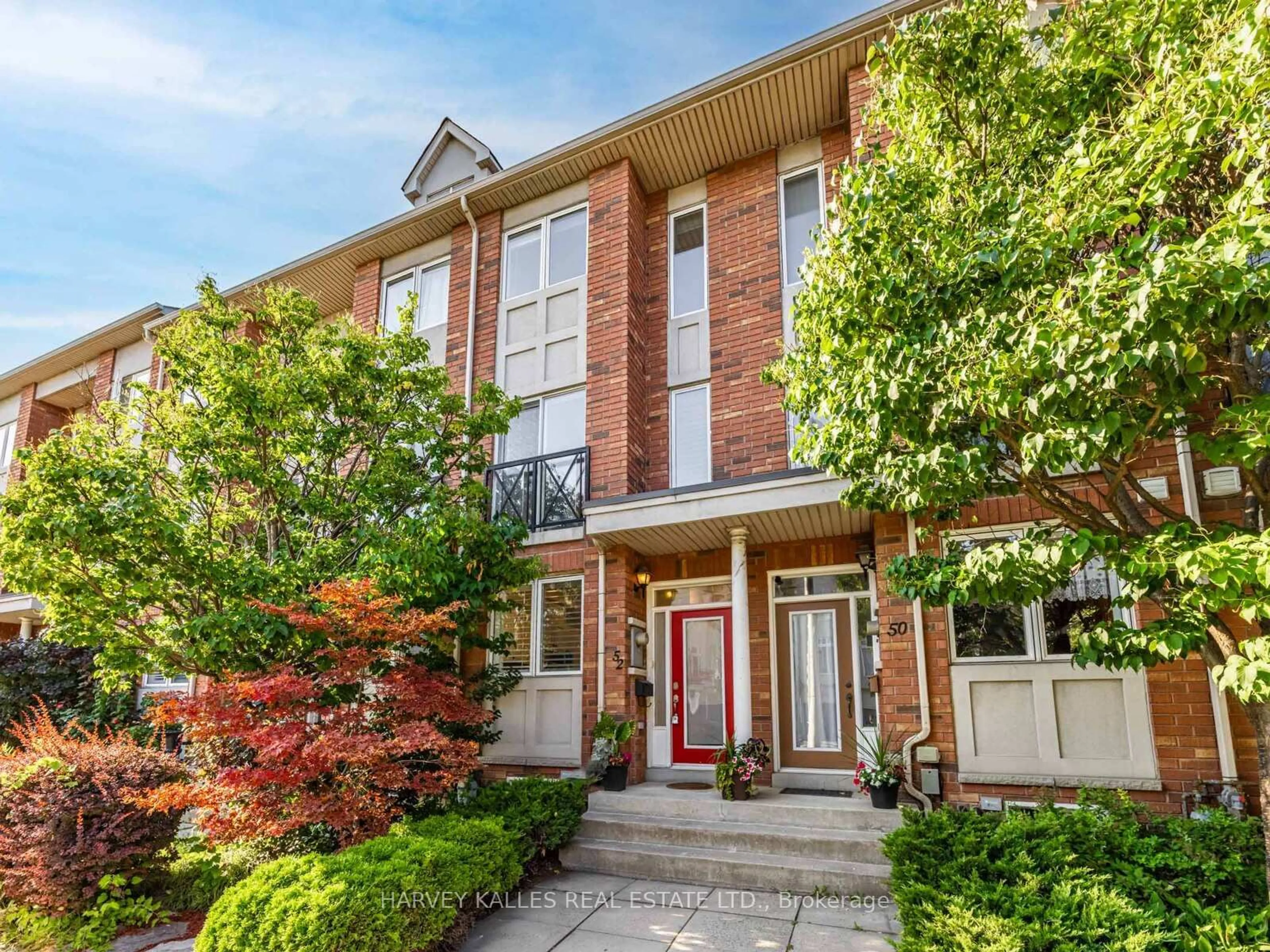 Home with brick exterior material, street for 52 Market Garden Mews, Toronto Ontario M8Z 0A5