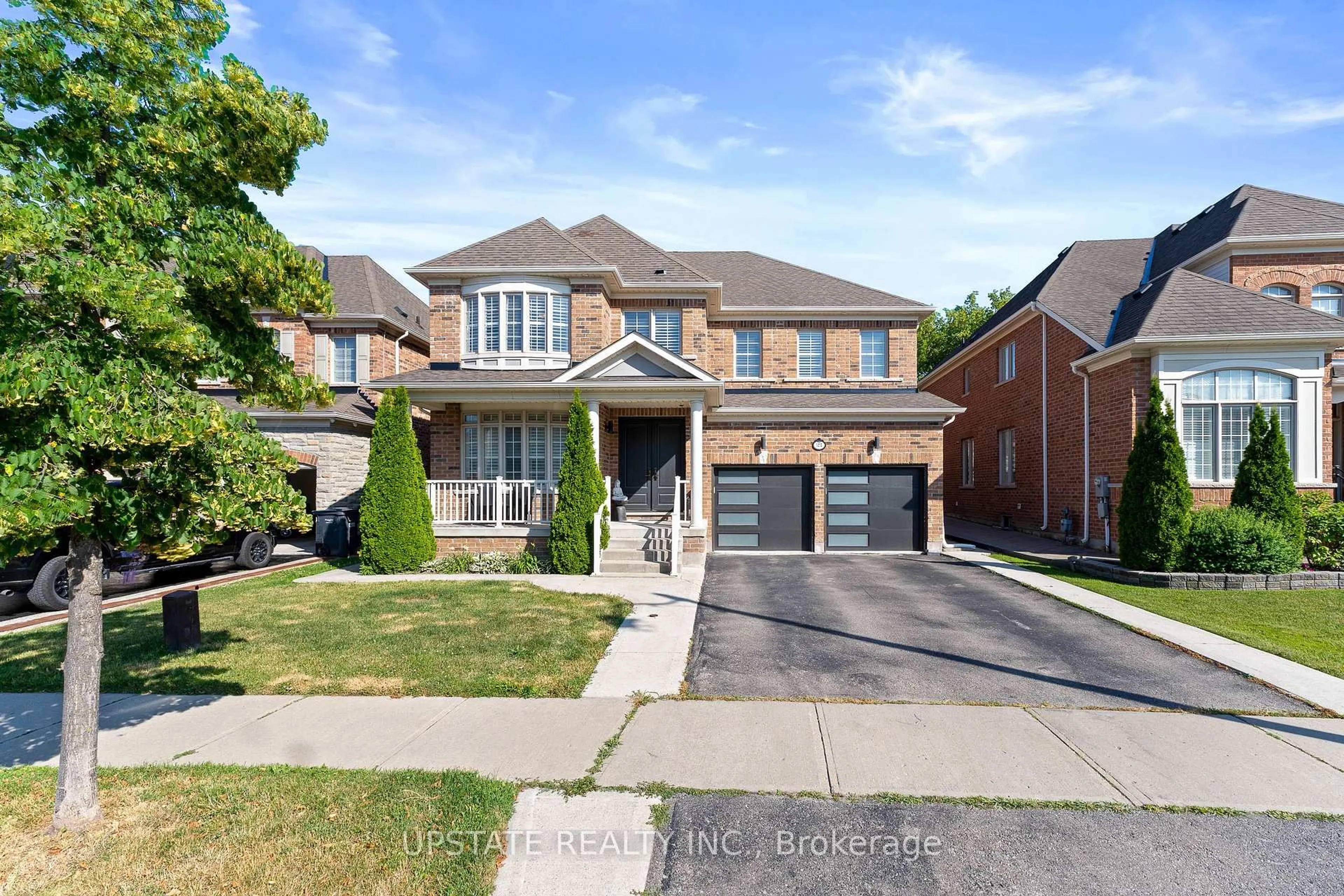 Home with brick exterior material, street for 21 Lauderhill Rd, Brampton Ontario L6P 2Z1