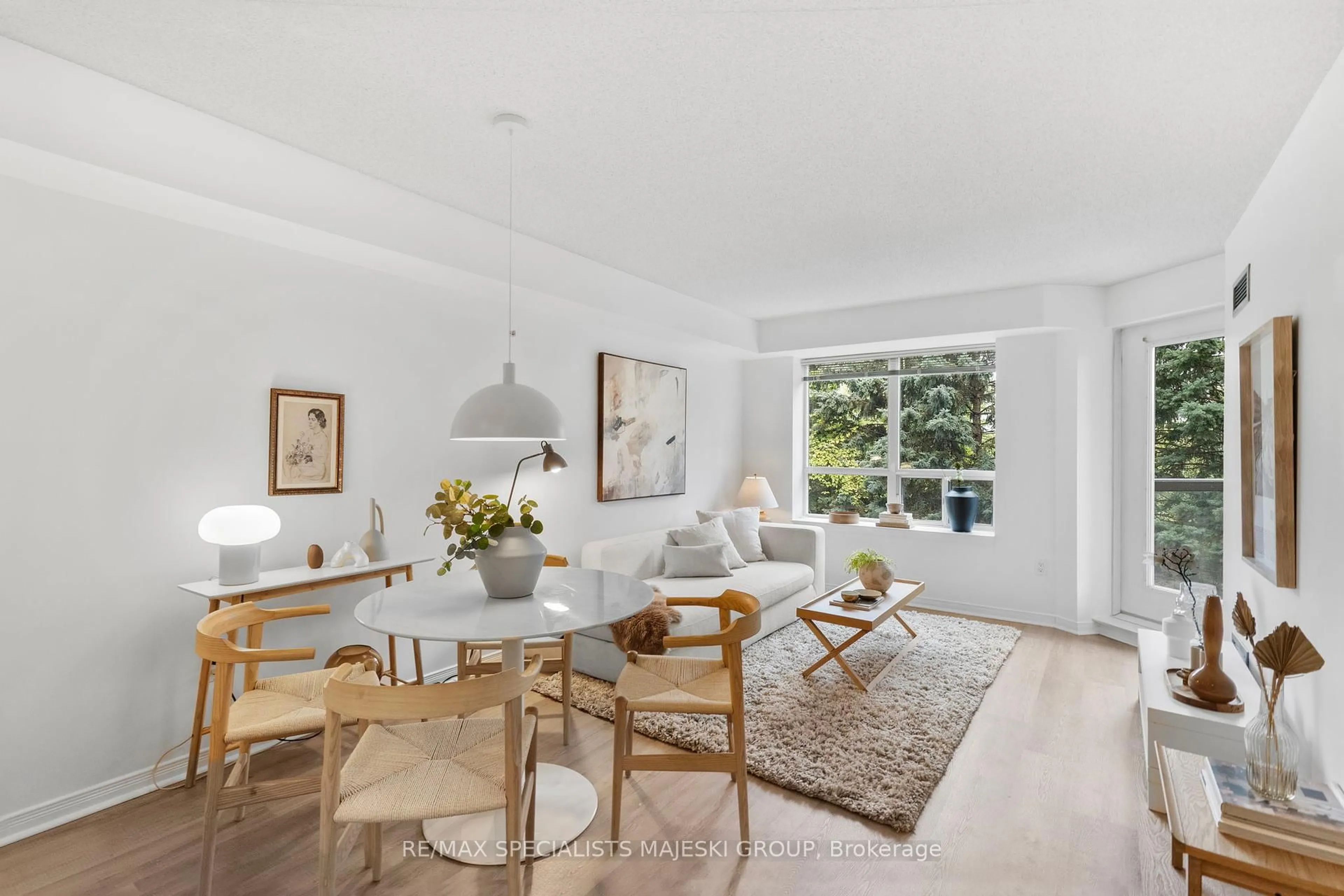 Living room with furniture, unknown for 300 Ray Lawson Blvd #307, Brampton Ontario L6Y 5H5