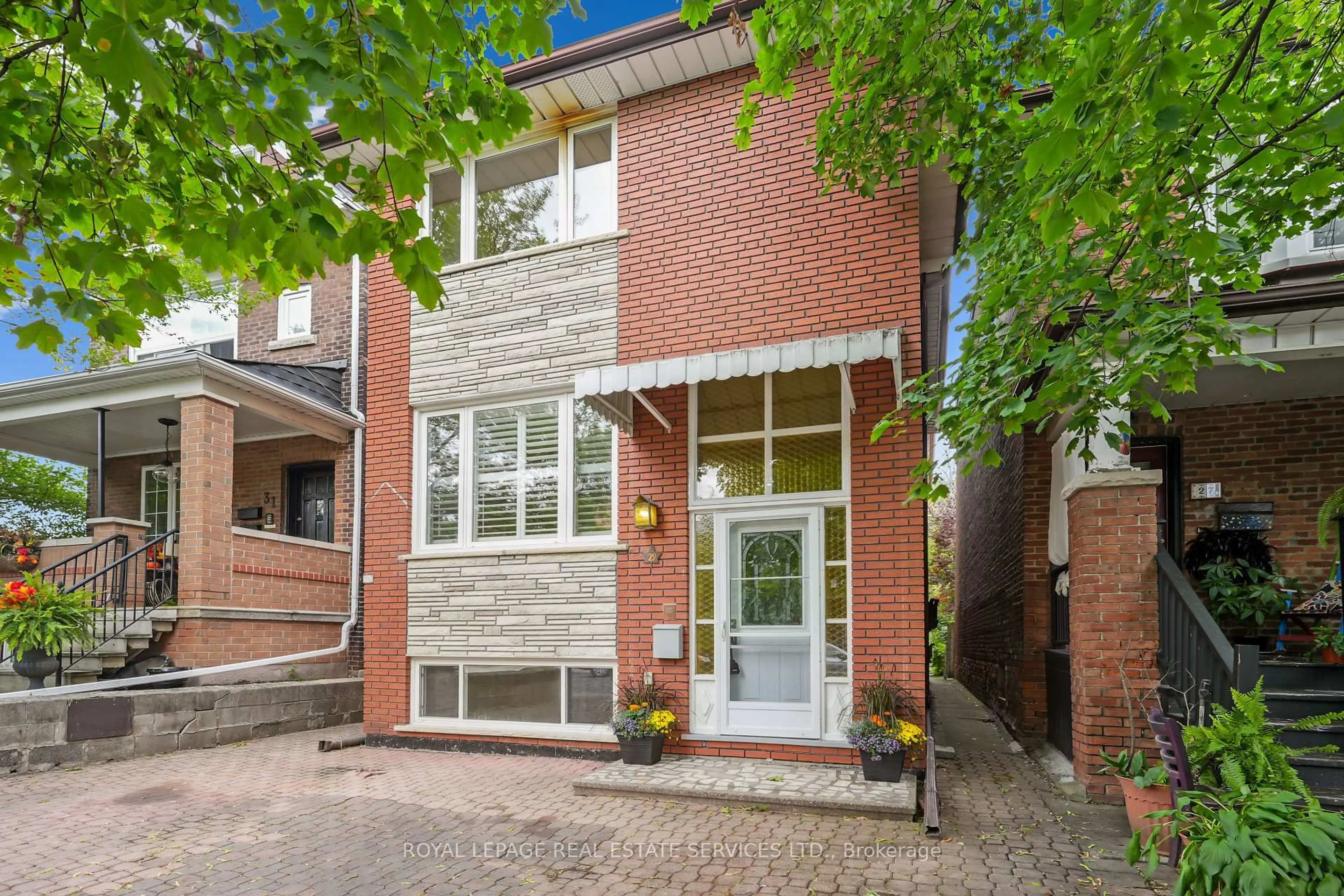 Home with brick exterior material, street for 29 Greenlaw Ave, Toronto Ontario M6H 3V6