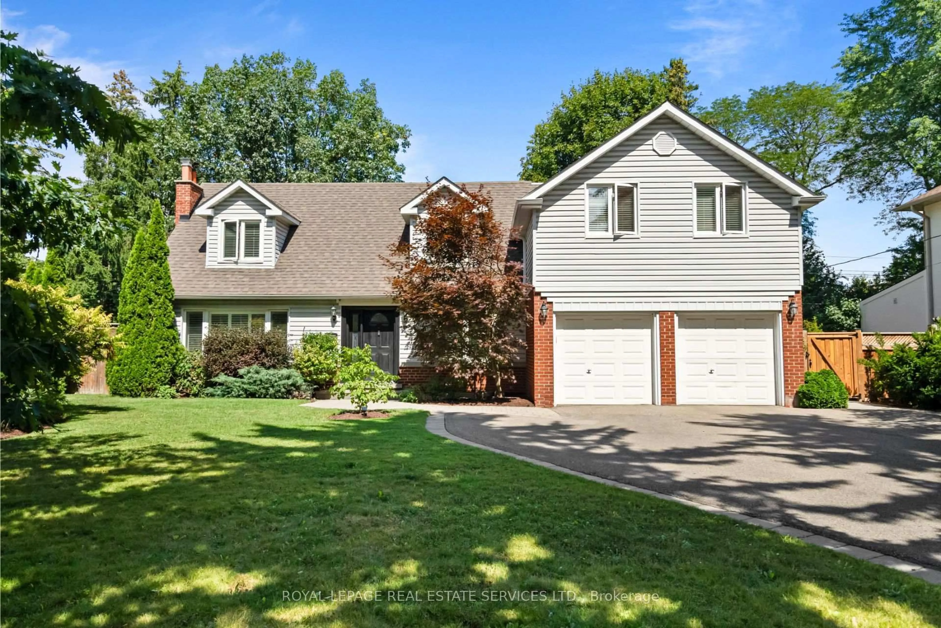 Home with brick exterior material, street for 70 Chestnut Hills Pkwy, Toronto Ontario M9A 3R2