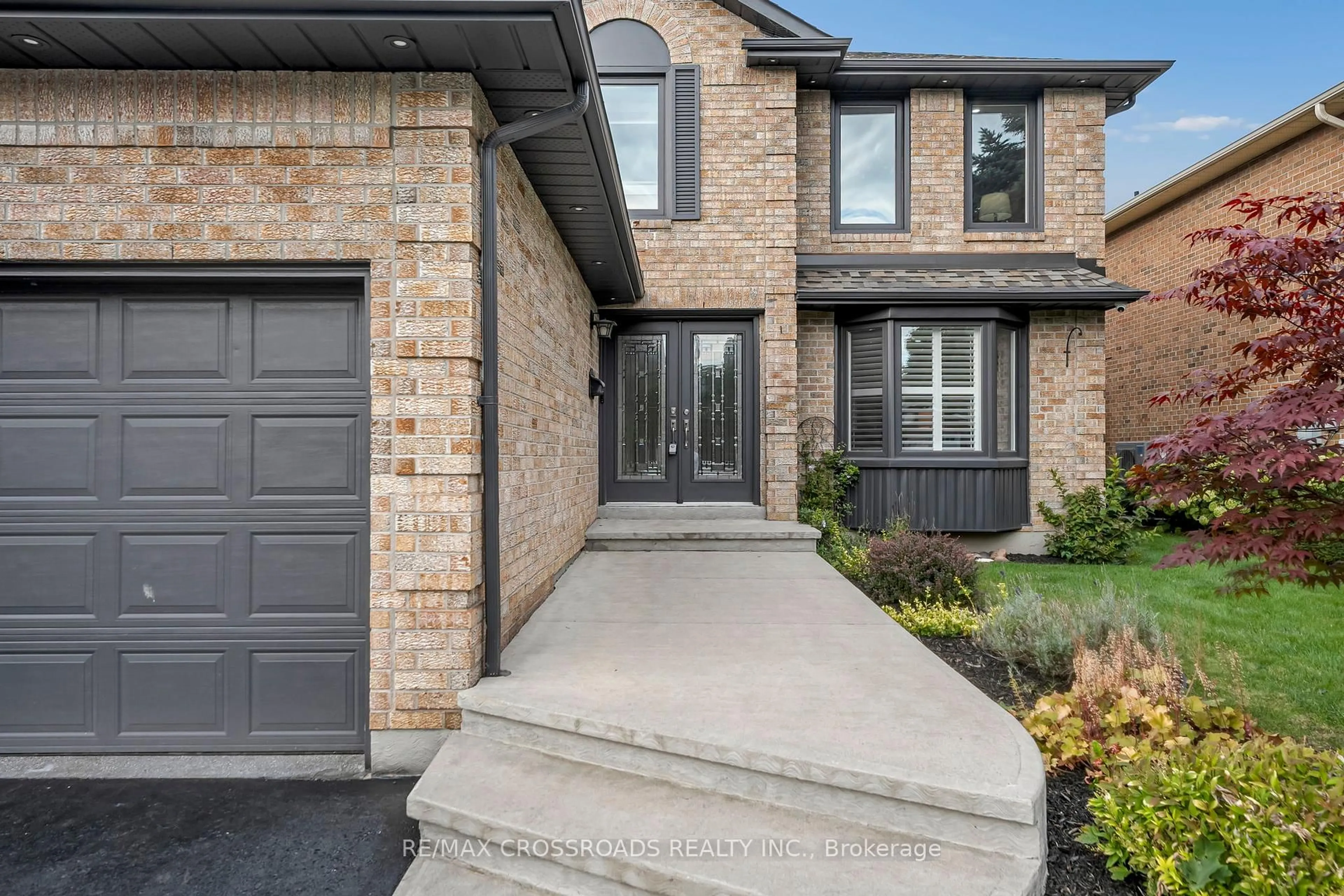 Home with brick exterior material, street for 75 Barr Cres, Brampton Ontario L6Z 3E3