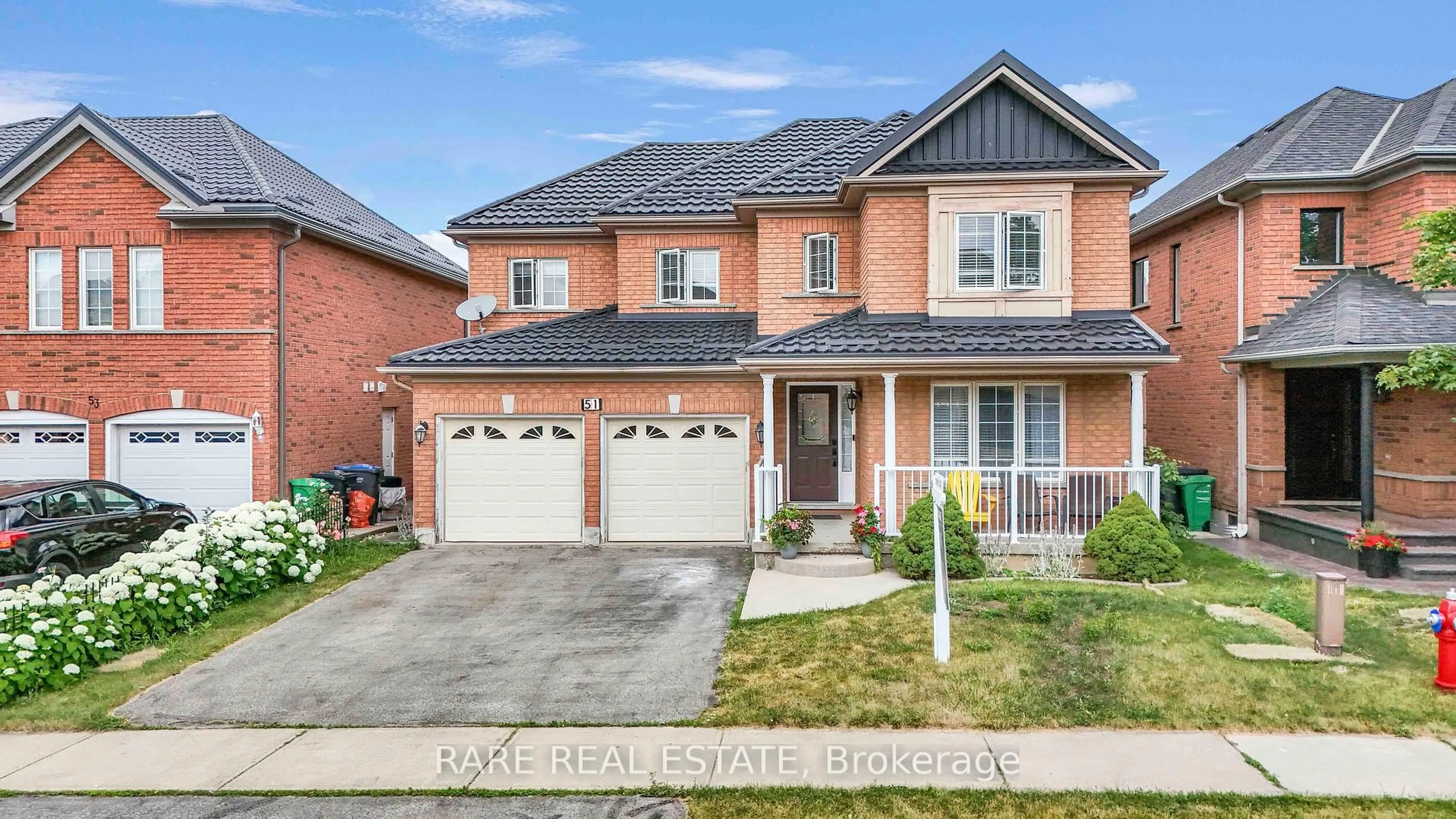 Home with brick exterior material, street for 51 Wild Indigo Cres, Brampton Ontario L6R 2J9