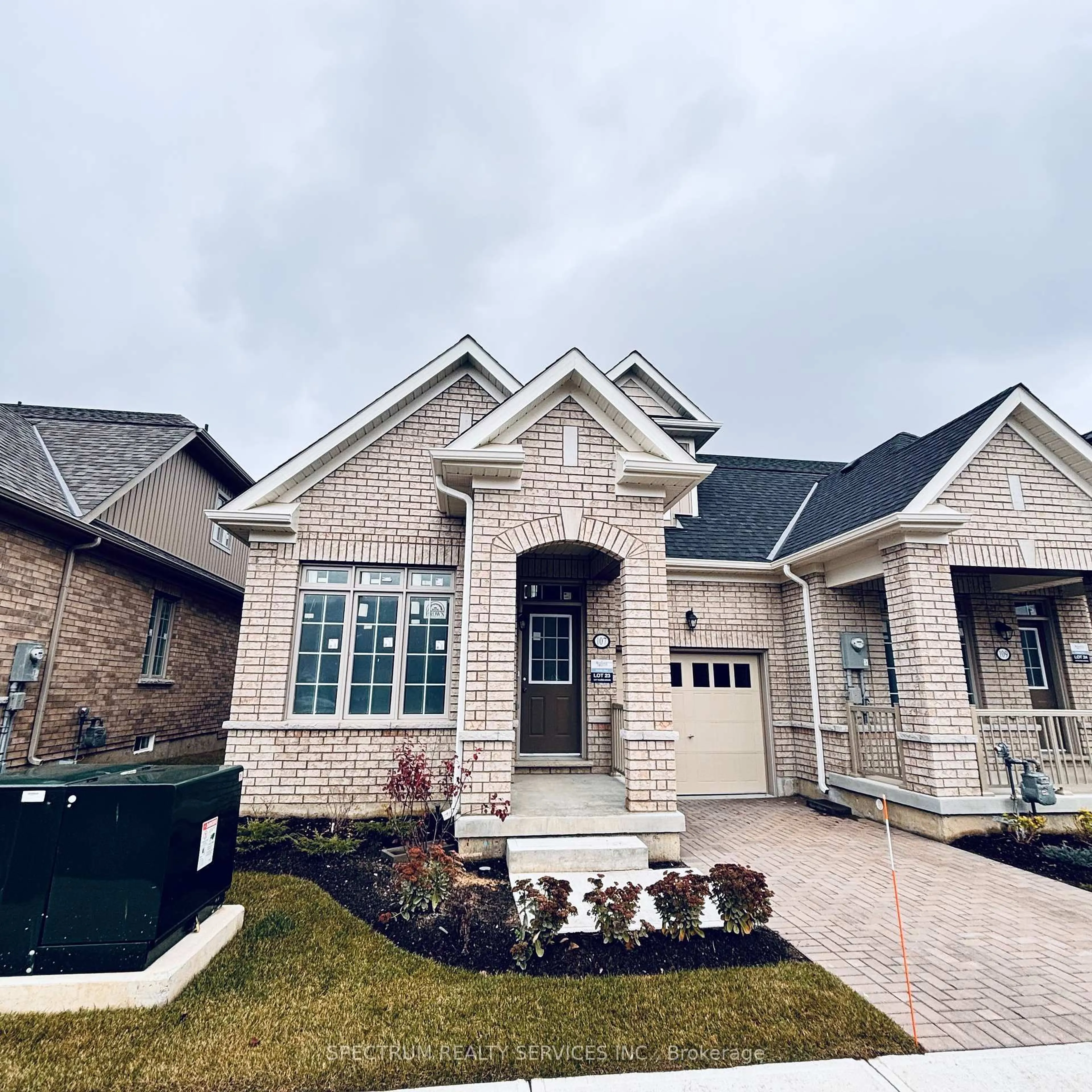 Home with brick exterior material, street for 107 Muzzo Dr, Brampton Ontario L6R 3Y4