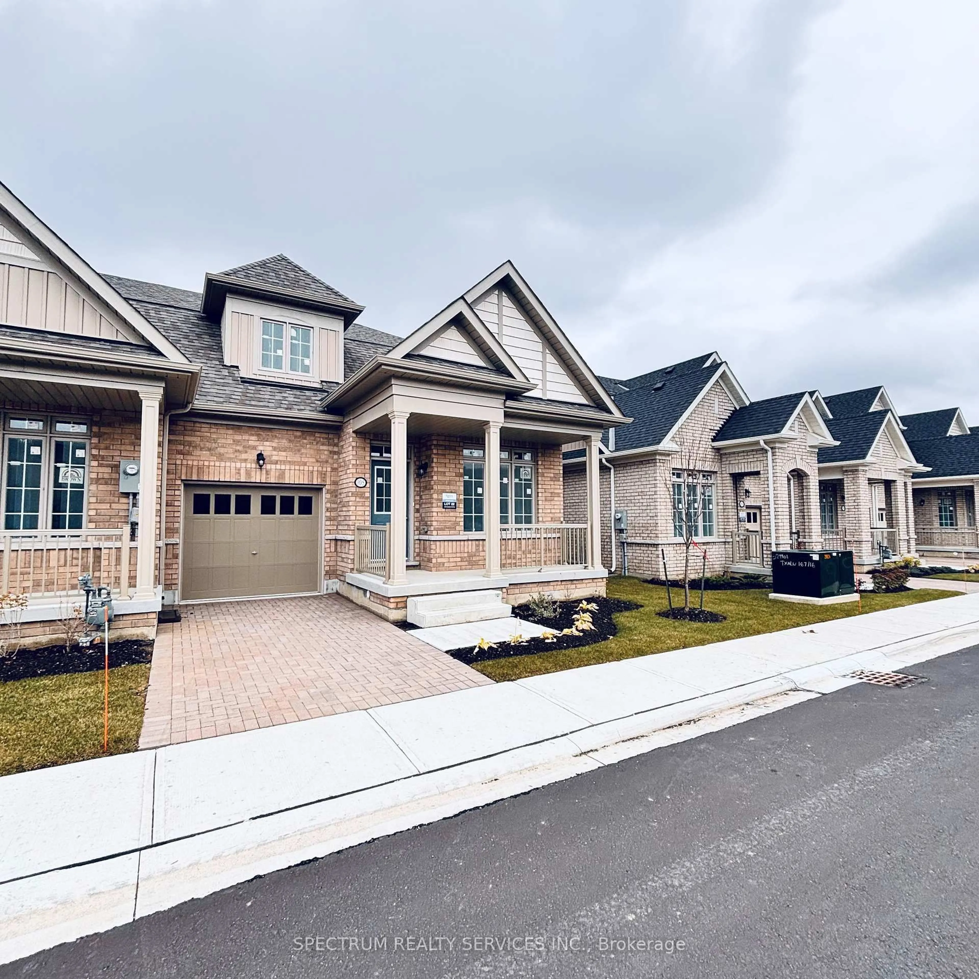 Home with brick exterior material, street for 107 Muzzo Dr, Brampton Ontario L6R 3Y4