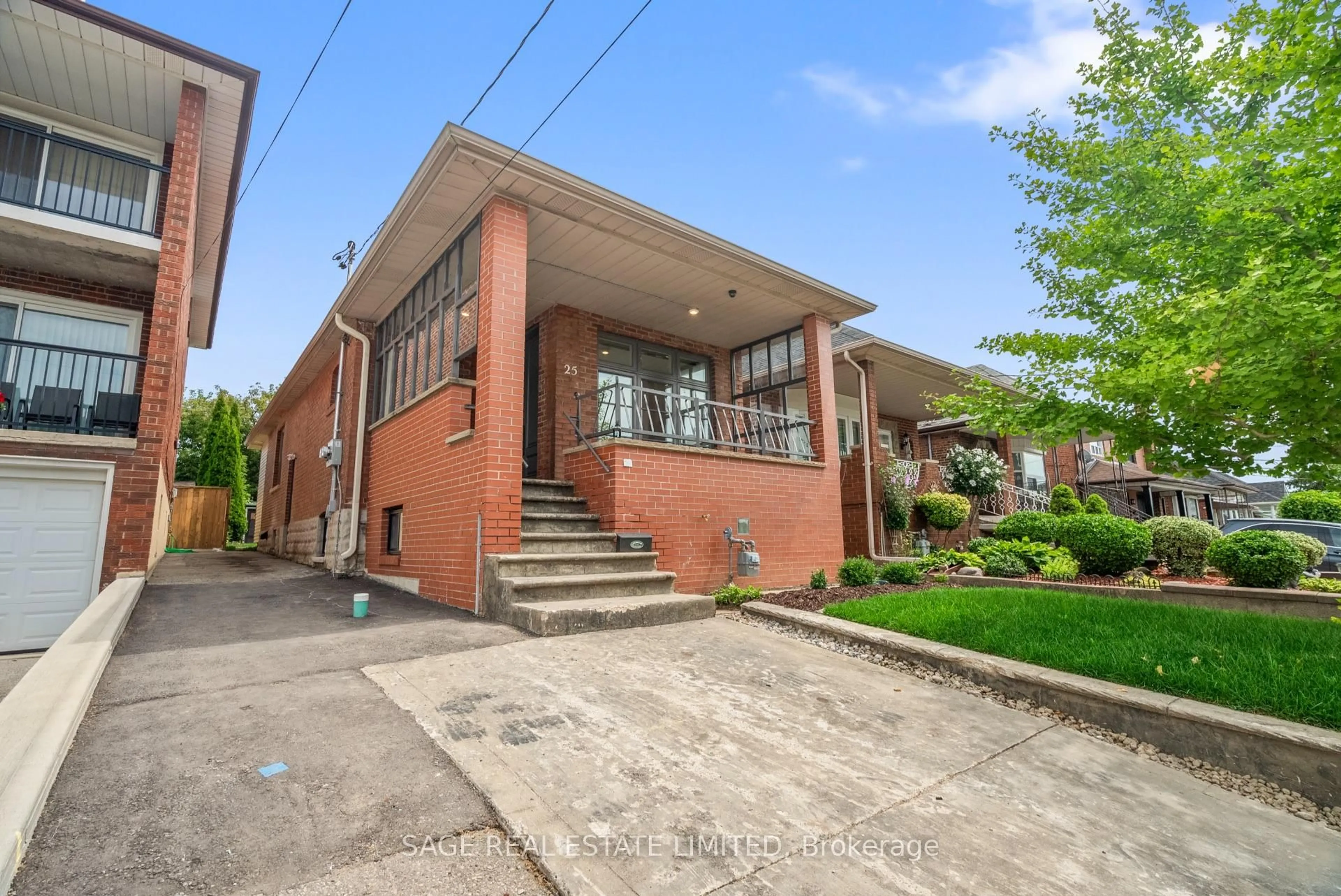 Home with brick exterior material, street for 25 Chamberlain Ave, Toronto Ontario M6E 4J7