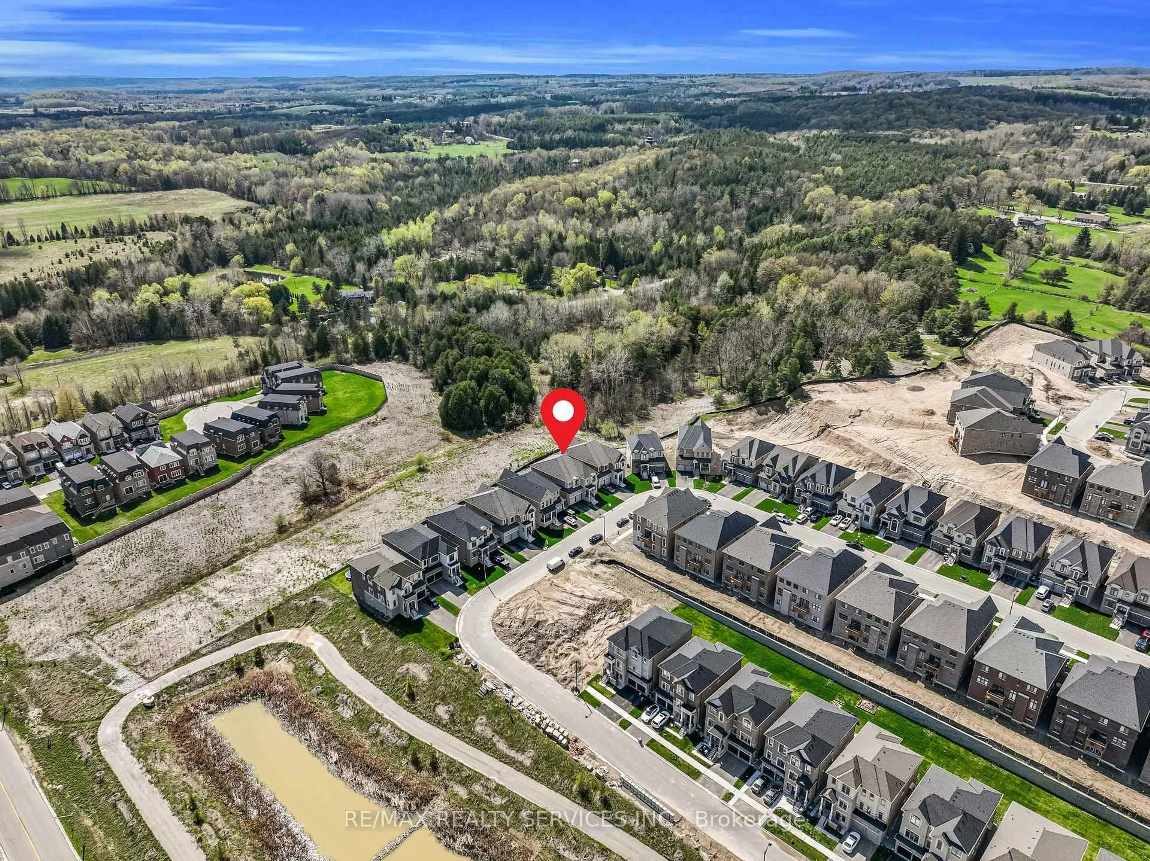 A pic from outside/outdoor area/front of a property/back of a property/a pic from drone, water/lake/river/ocean view for 67 James Walker Ave, Caledon Ontario L7C 4M8