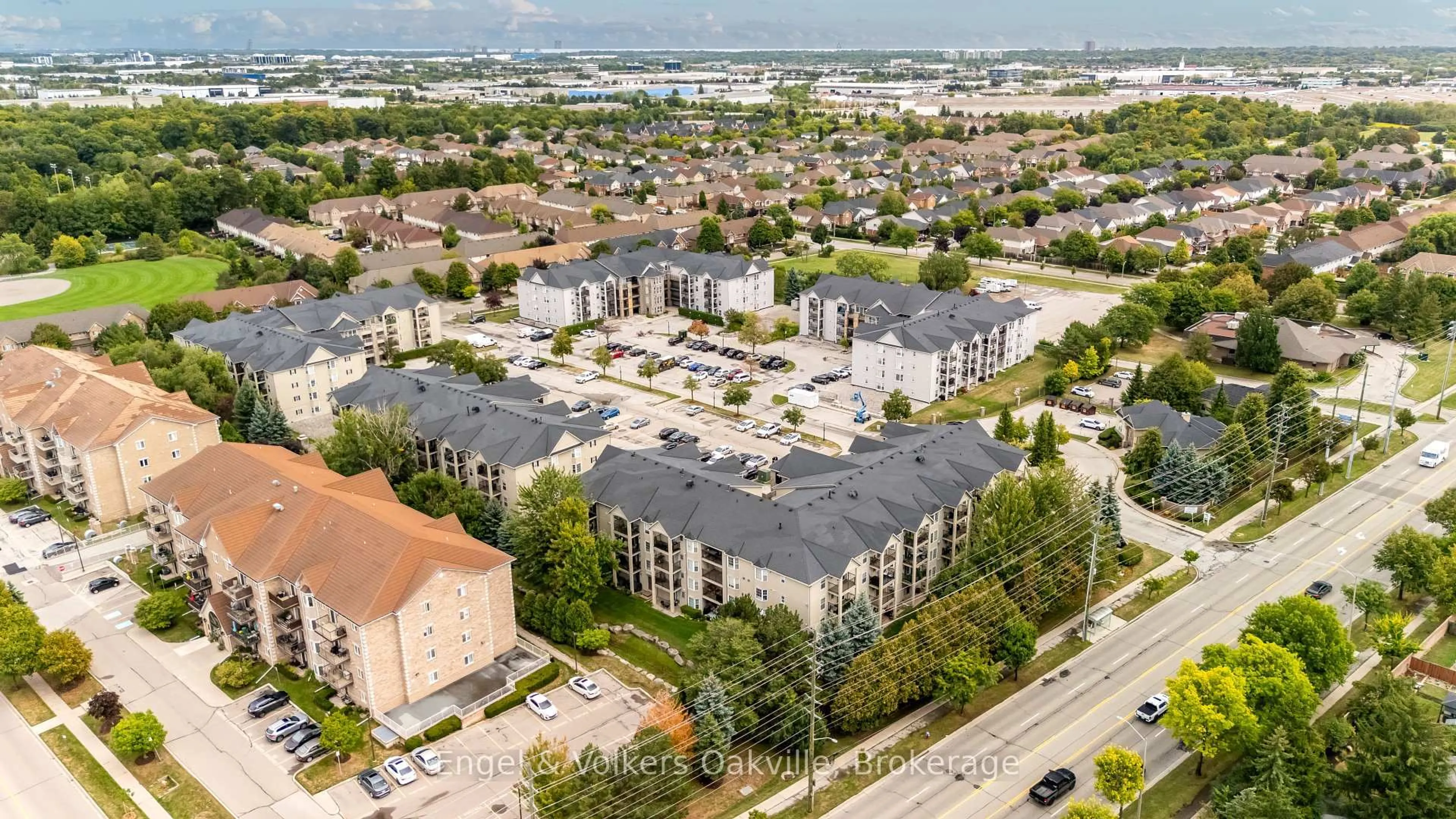 A pic from outside/outdoor area/front of a property/back of a property/a pic from drone, city buildings view from balcony for 1451 Walkers Line #411, Burlington Ontario L7M 4P1