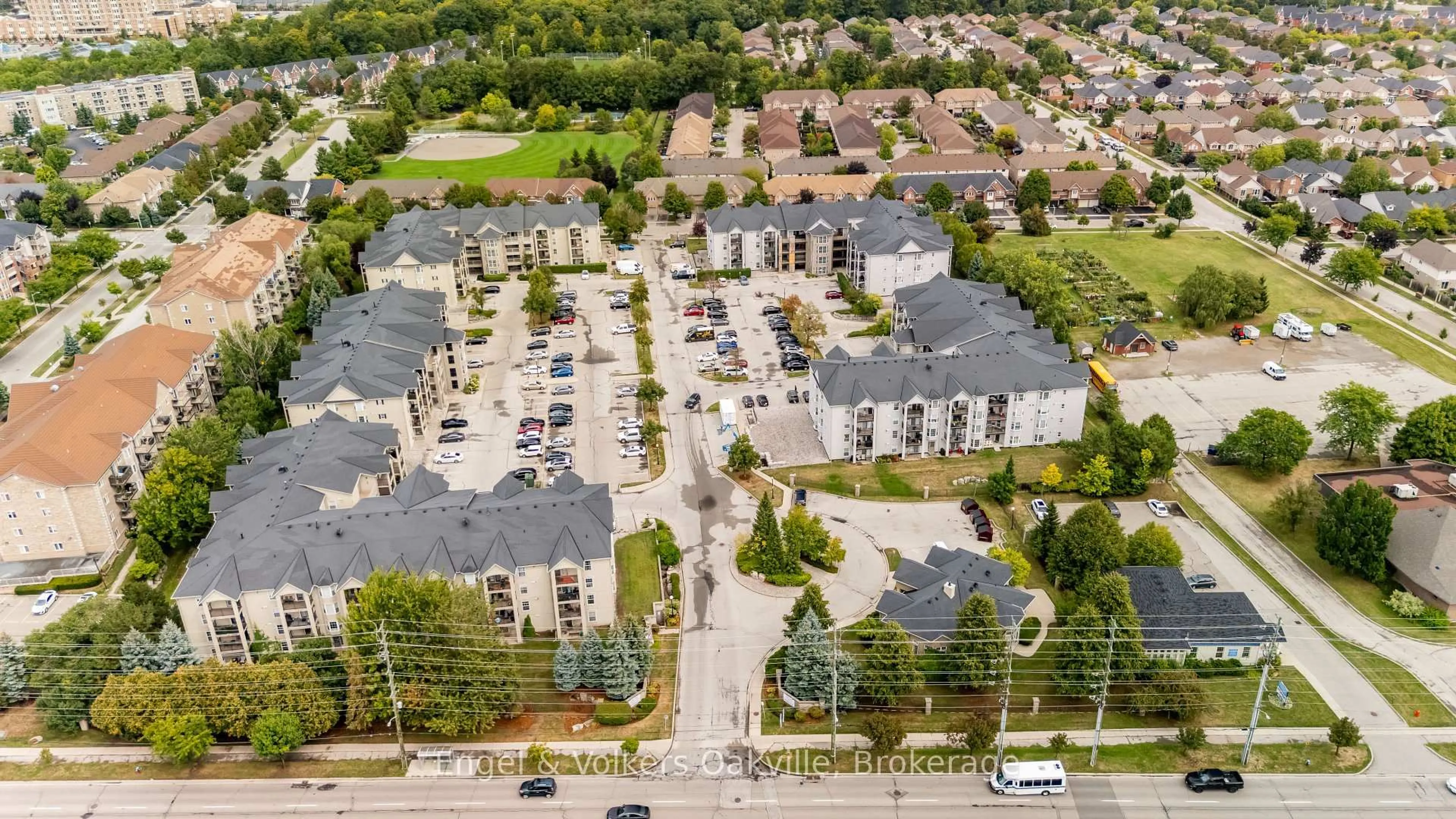 A pic from outside/outdoor area/front of a property/back of a property/a pic from drone, street for 1451 Walkers Line #411, Burlington Ontario L7M 4P1