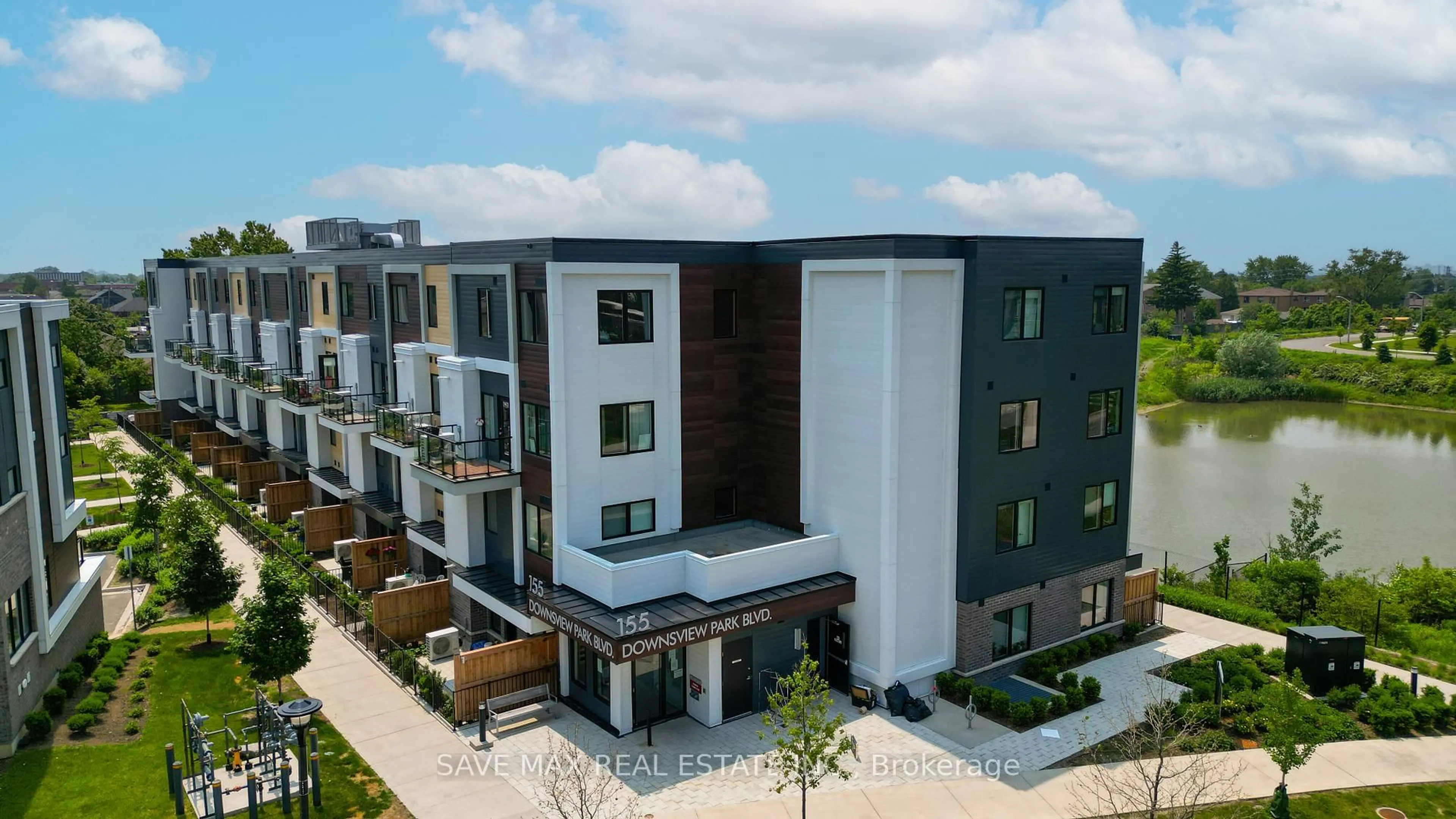 A pic from outside/outdoor area/front of a property/back of a property/a pic from drone, building for 155 Downsview Park Blvd #215, Toronto Ontario M3K 0E3