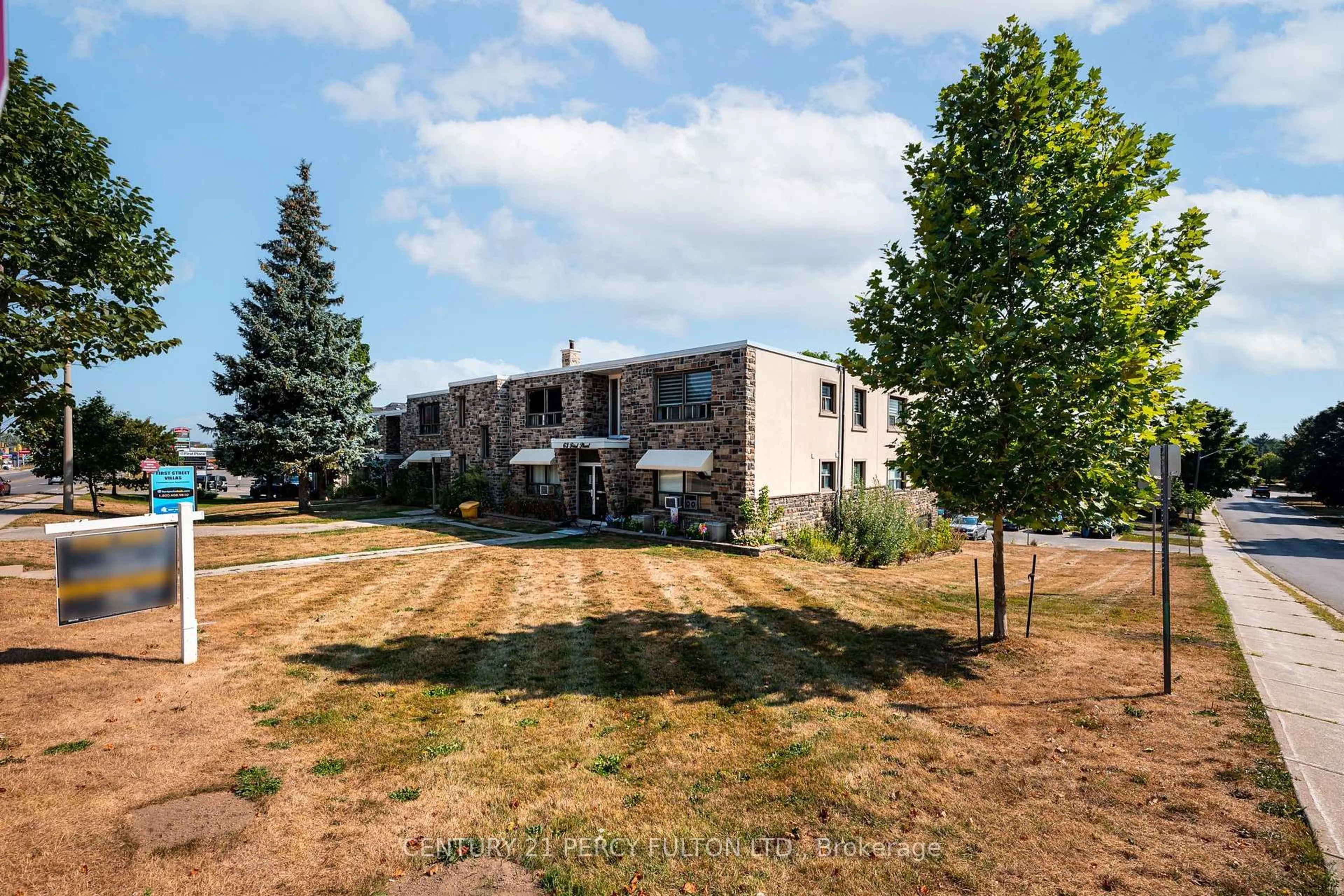 A pic from outside/outdoor area/front of a property/back of a property/a pic from drone, unknown for 63 First St #21, Orangeville Ontario L9W 2E6