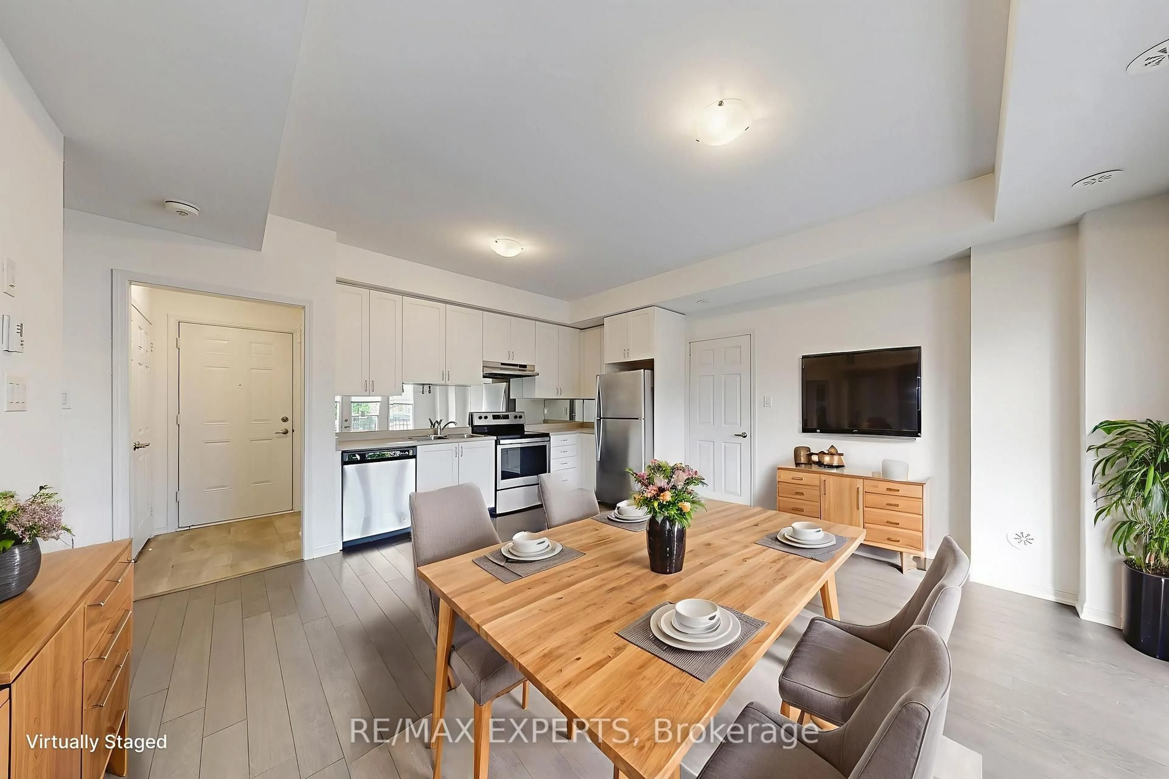 Open concept kitchen, wood/laminate floor for 250 Sunny Meadow Blvd #33, Brampton Ontario L6R 3Y7