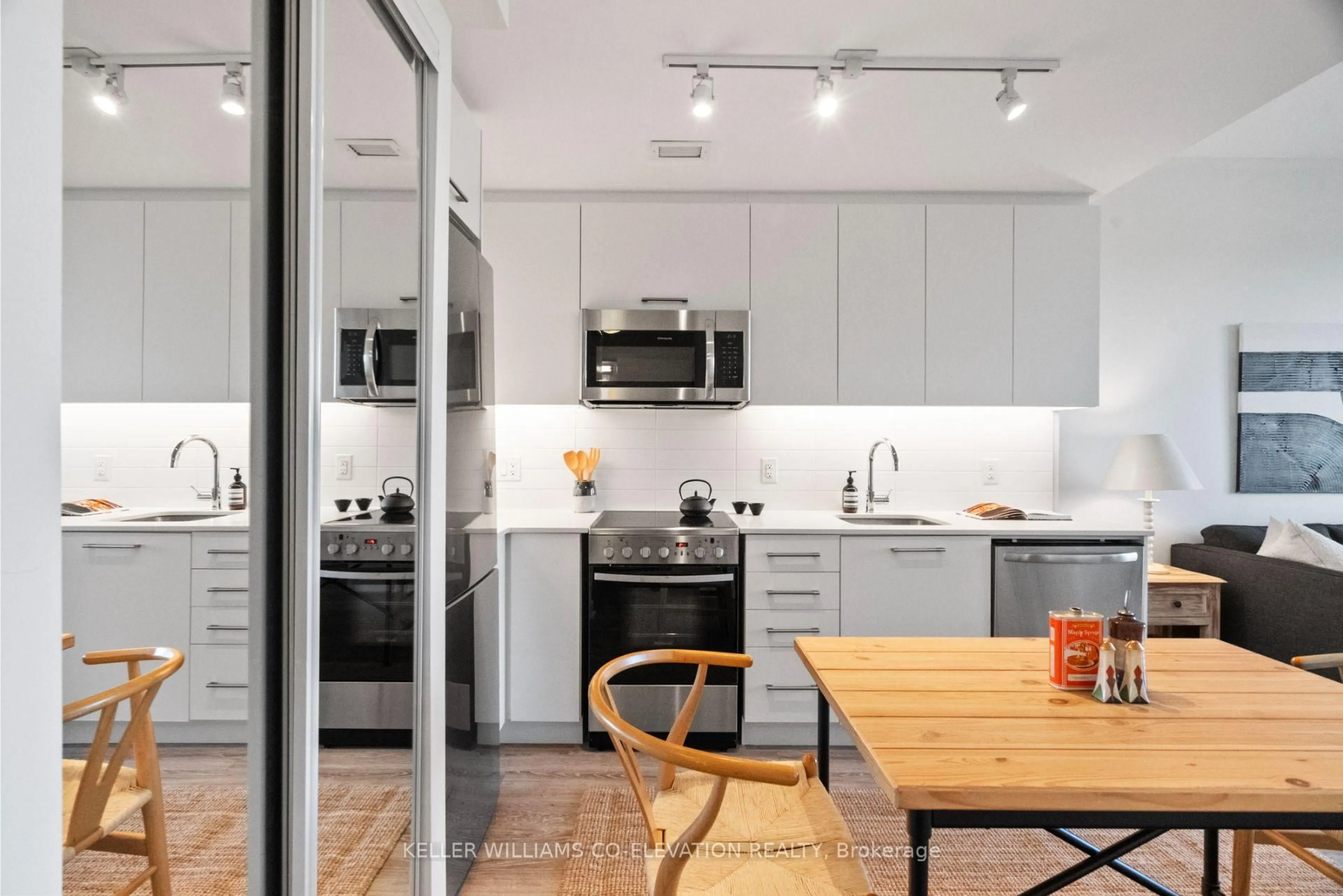 Open concept kitchen, unknown for 1 Neighbourhood Lane #607, Toronto Ontario M8Y 0C2