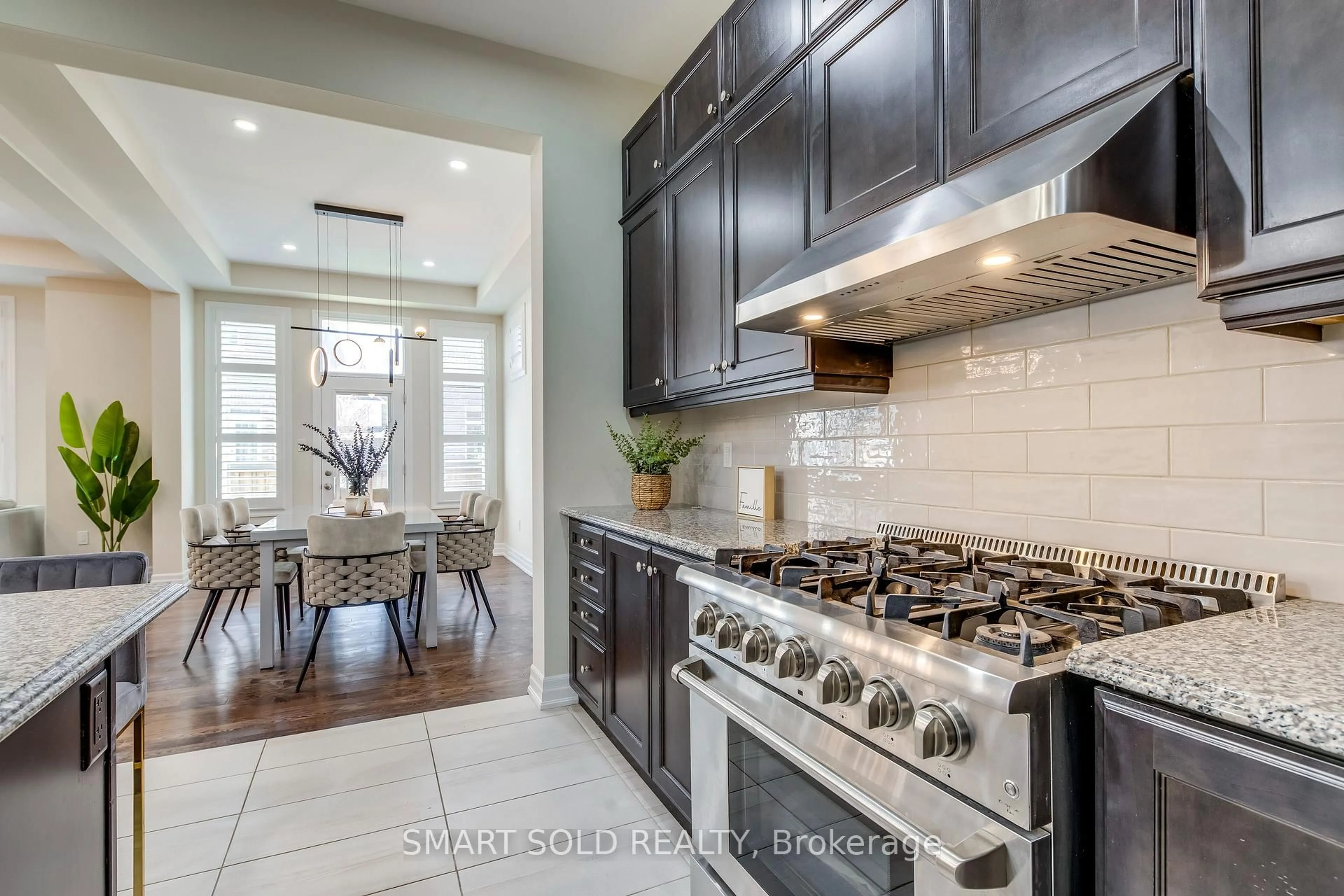 Open concept kitchen, ceramic/tile floor for 3263 Donald Mackay St, Oakville Ontario L6M 0T1