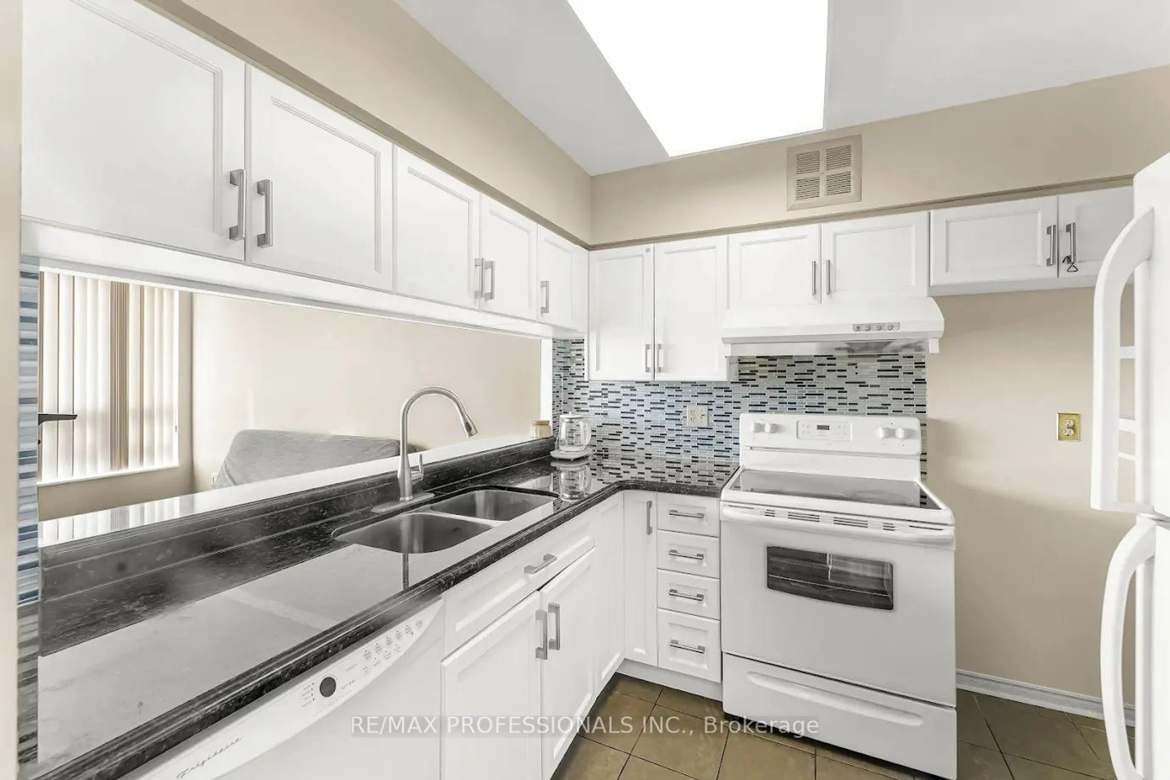 Standard kitchen, ceramic/tile floor for 50 Kingsbridge Garden Circ #1502, Mississauga Ontario L5R 1Y2