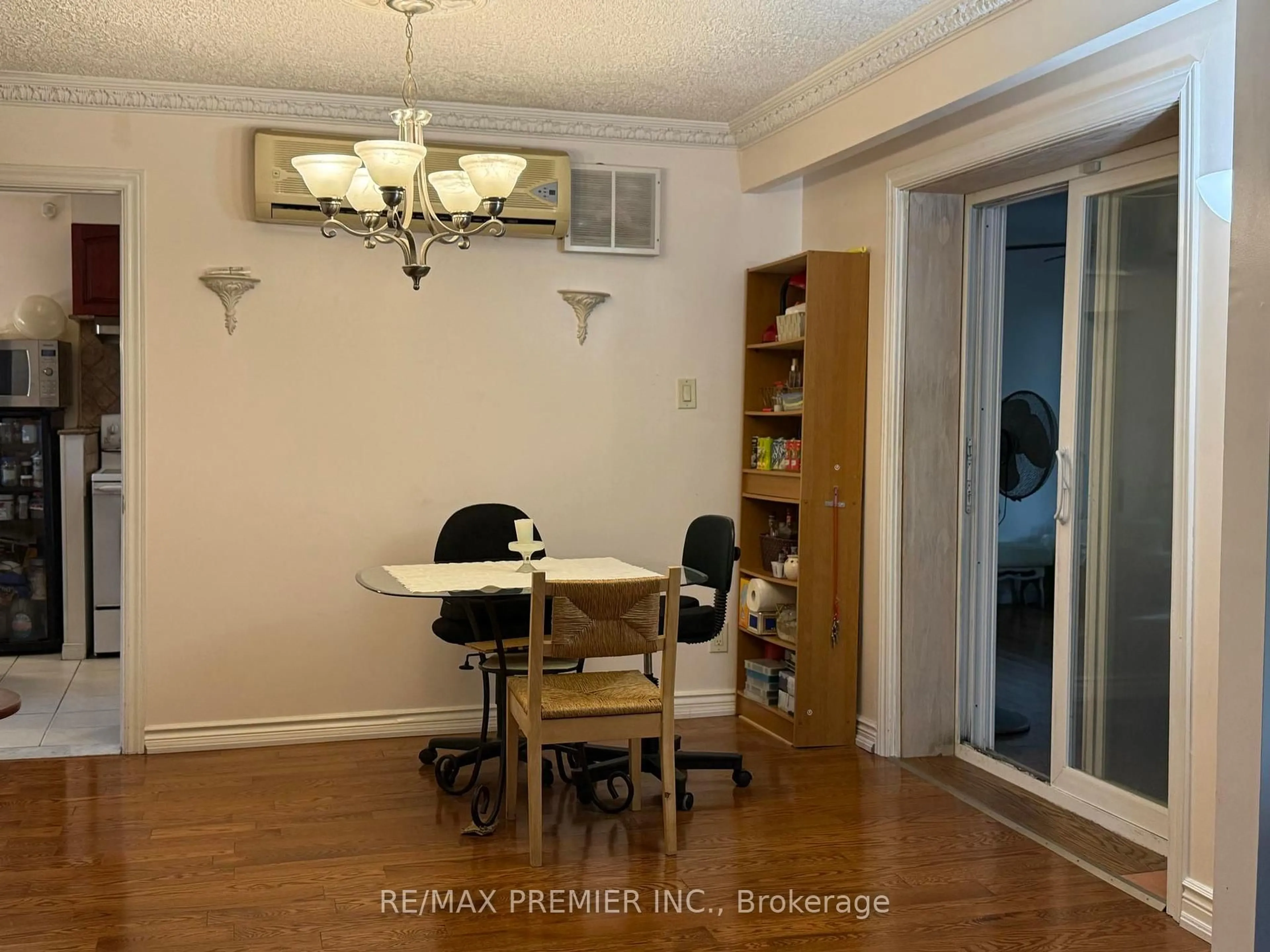 Dining room, wood/laminate floor for 37 Dee Ave, Toronto Ontario M9N 1S8
