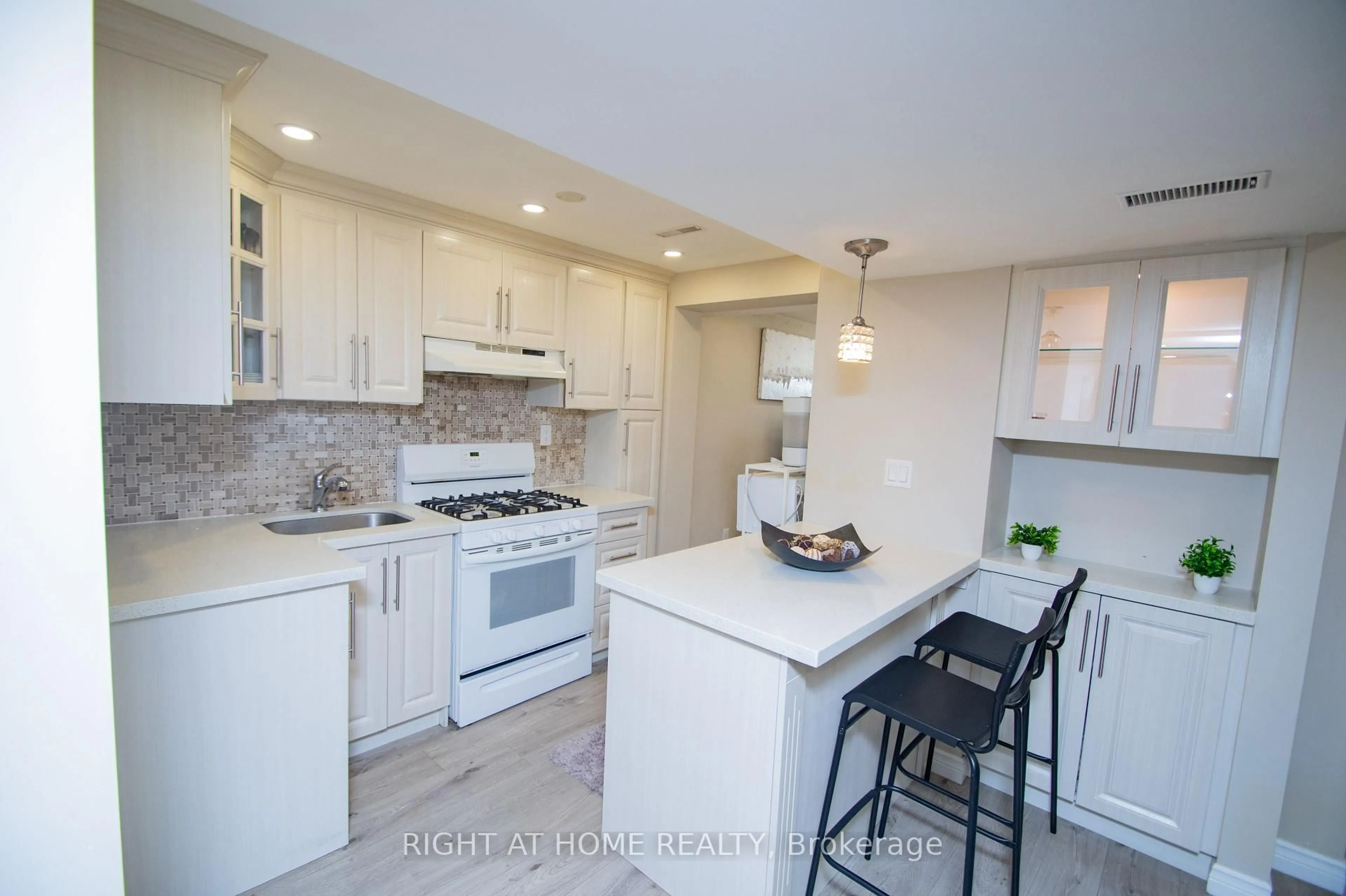 Open concept kitchen, ceramic/tile floor for 65 Bridgenorth Cres, Toronto Ontario M9V 2M5