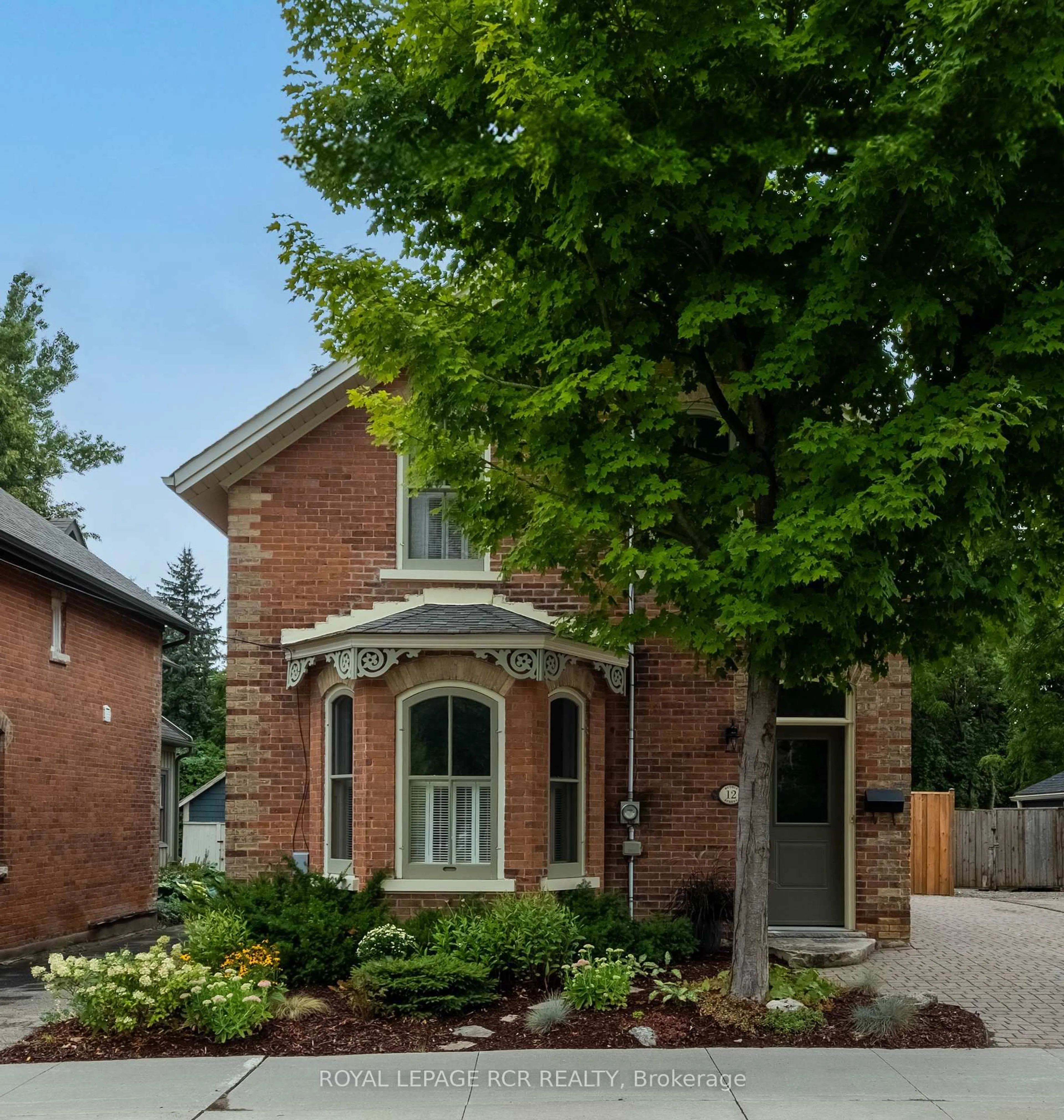 Home with brick exterior material, street for 12 Bythia St, Orangeville Ontario L9W 2S1