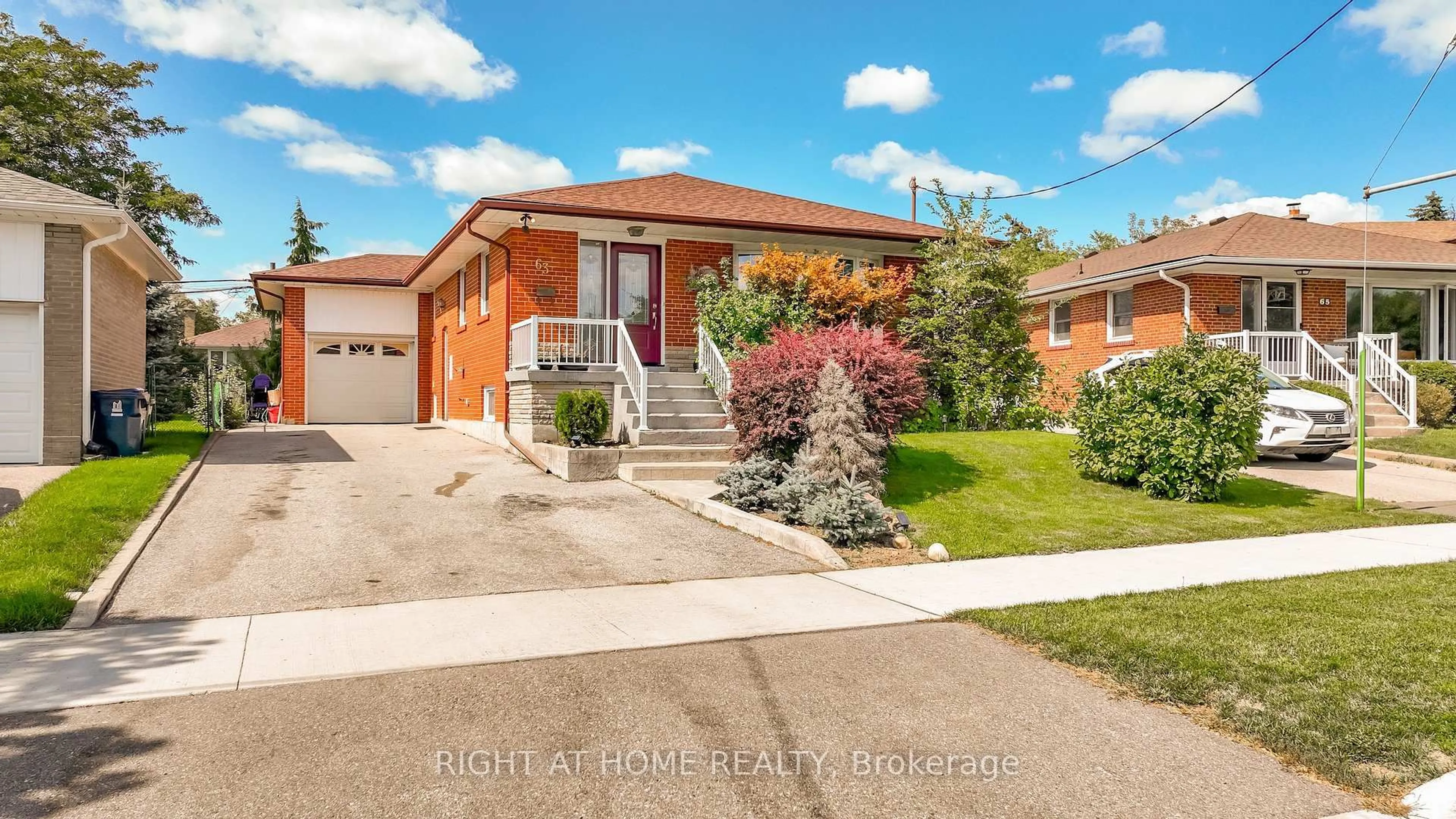 Home with brick exterior material, street for 63 Allonsius Dr, Toronto Ontario M9C 3N6