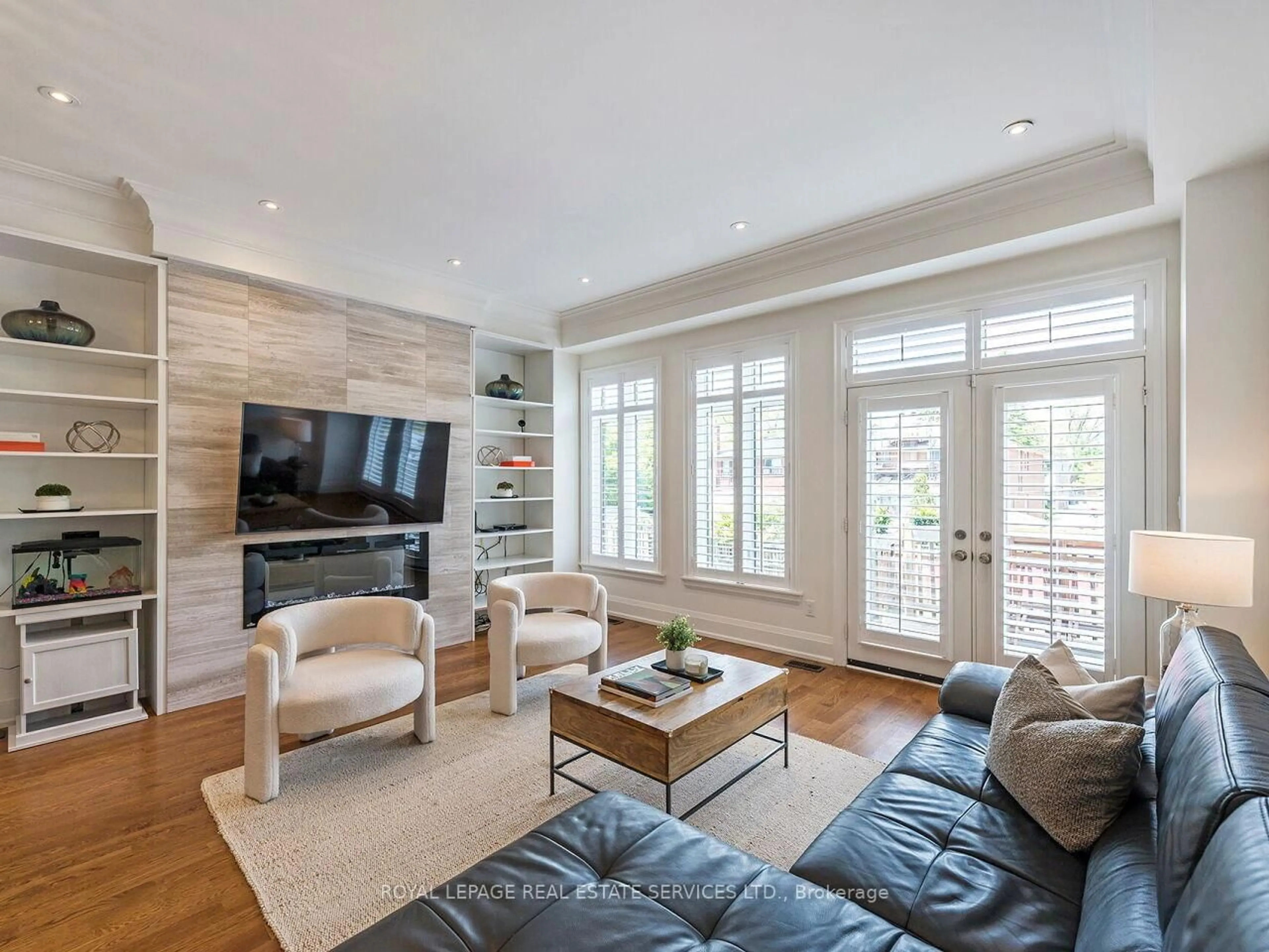 Living room with furniture, wood/laminate floor for 22 Portland St, Toronto Ontario M8Y 1A5