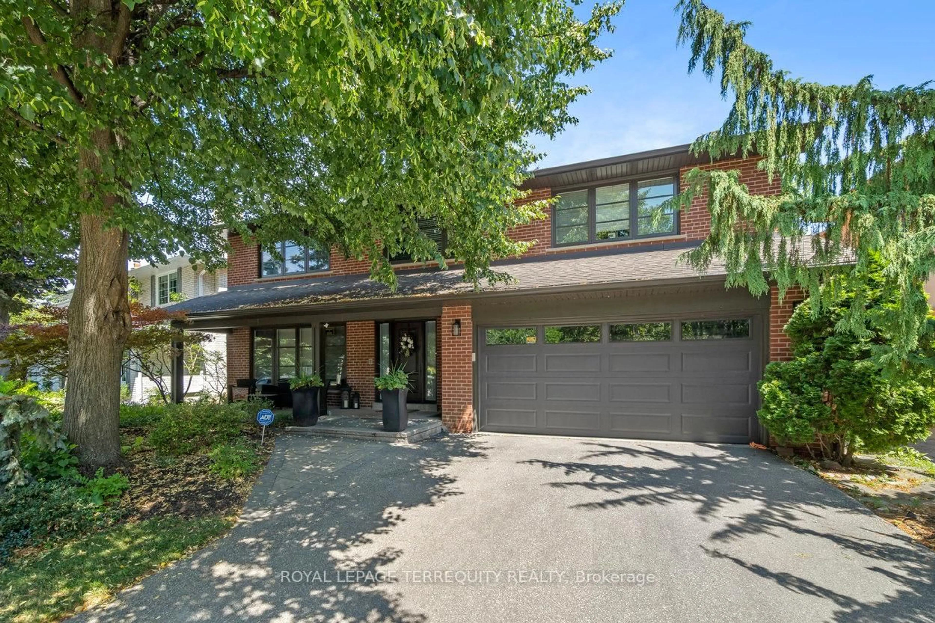 Home with brick exterior material, street for 33 Ashford Dr, Toronto Ontario M9B 5X2