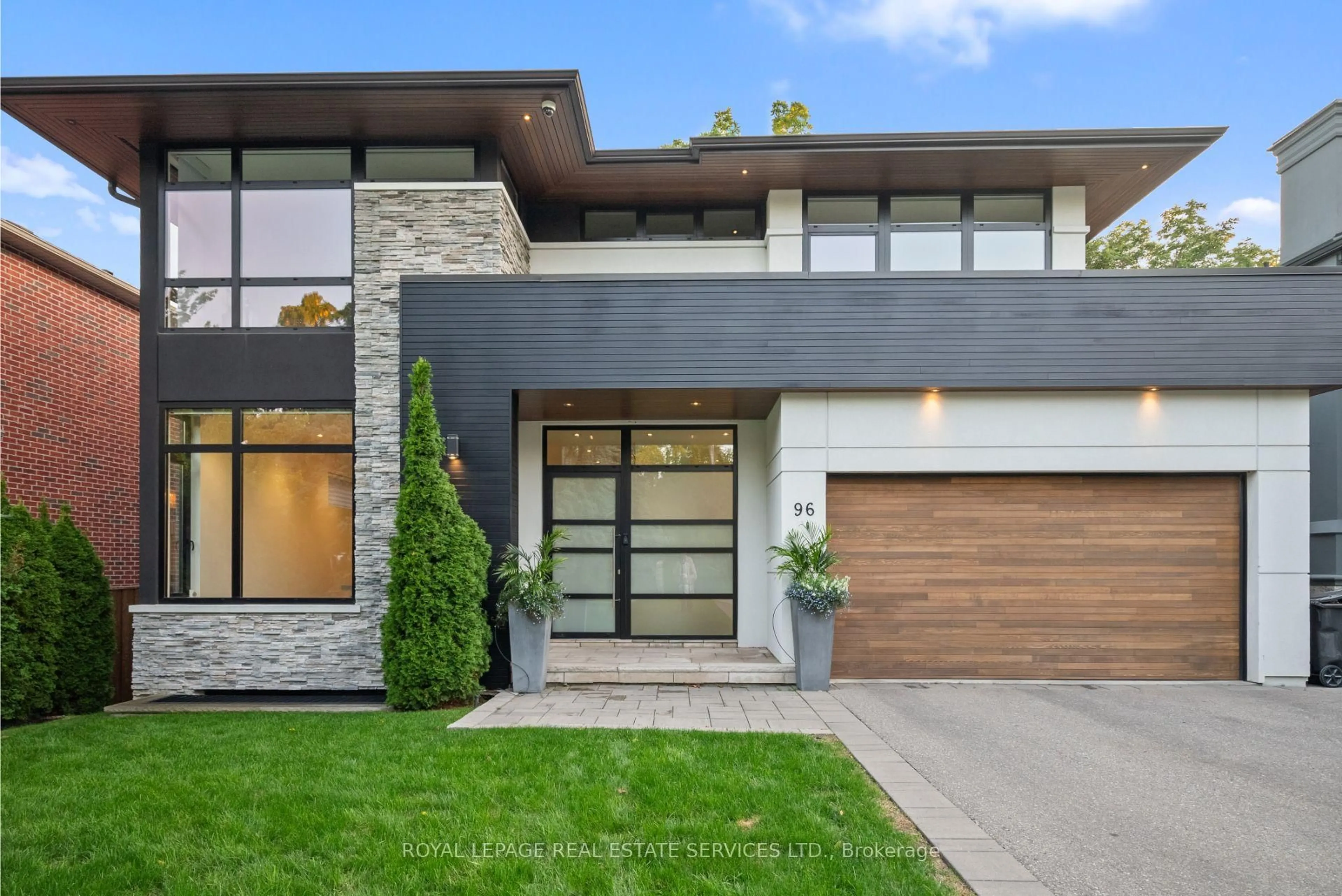 Home with brick exterior material, street for 96 Montgomery Rd, Toronto Ontario M9A 3N5