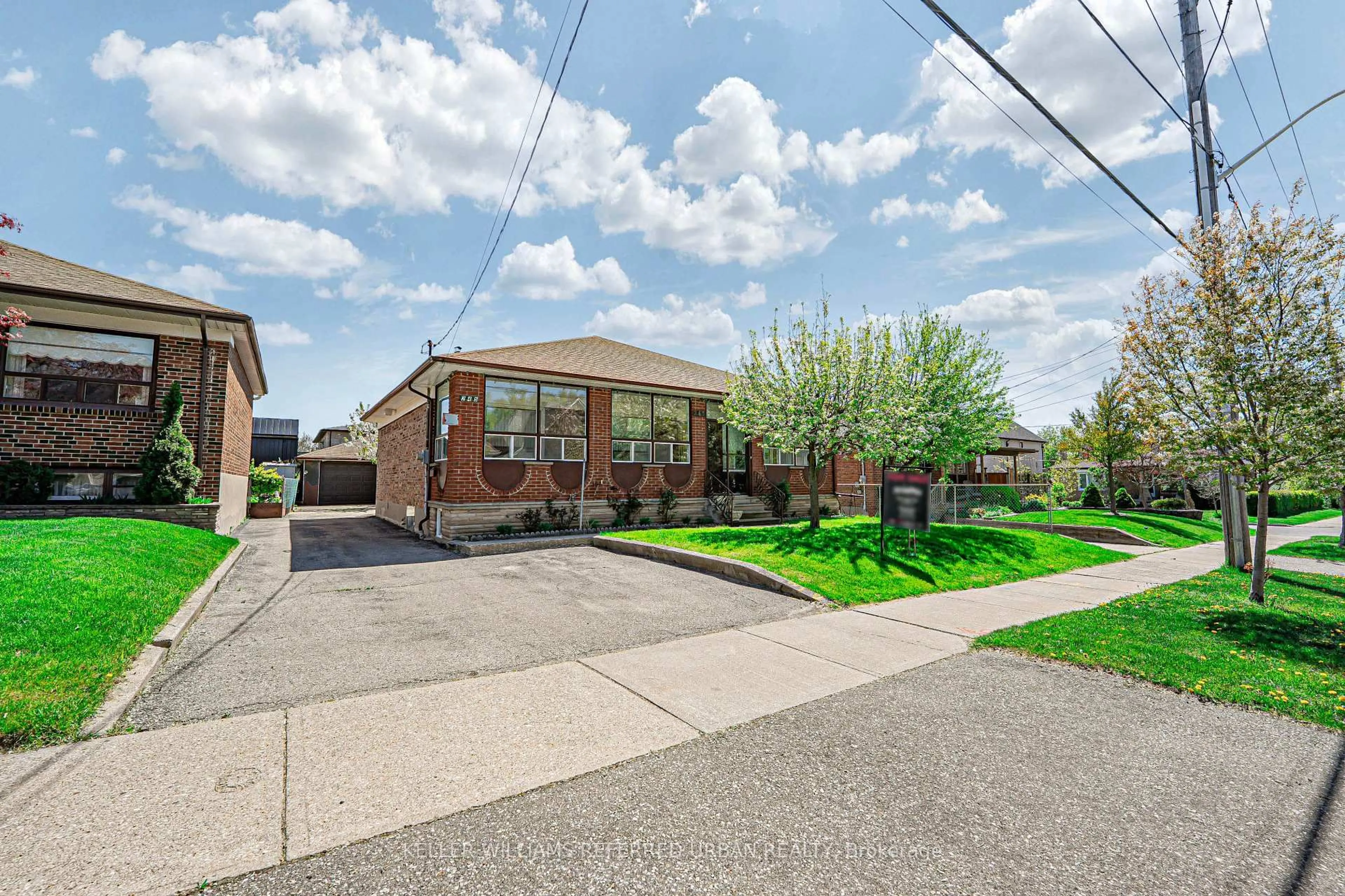 Home with brick exterior material, street for 245 Falstaff Ave, Toronto Ontario M6L 2G3