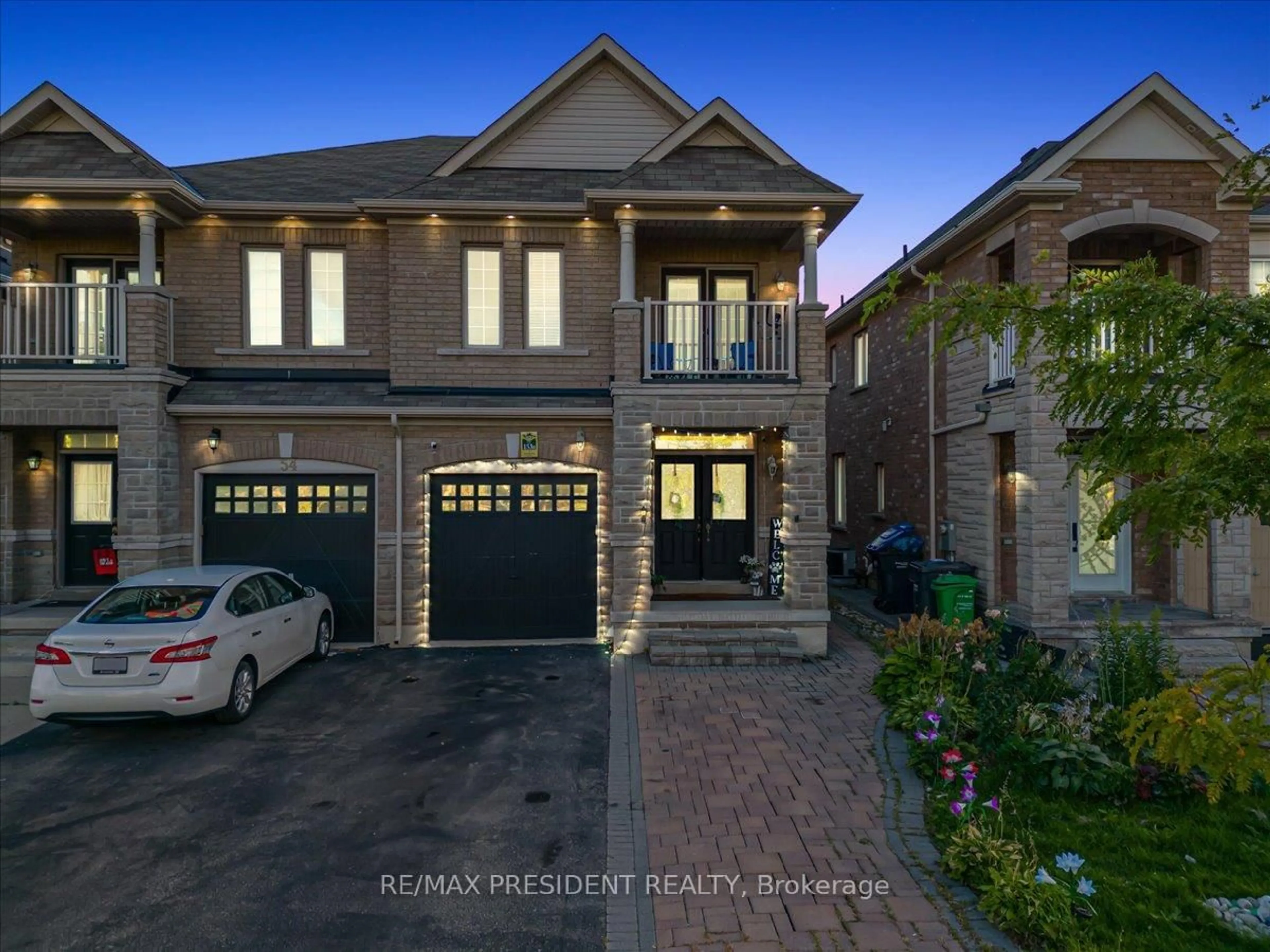 Home with brick exterior material, street for 56 Natronia Tr, Brampton Ontario L6P 3N8