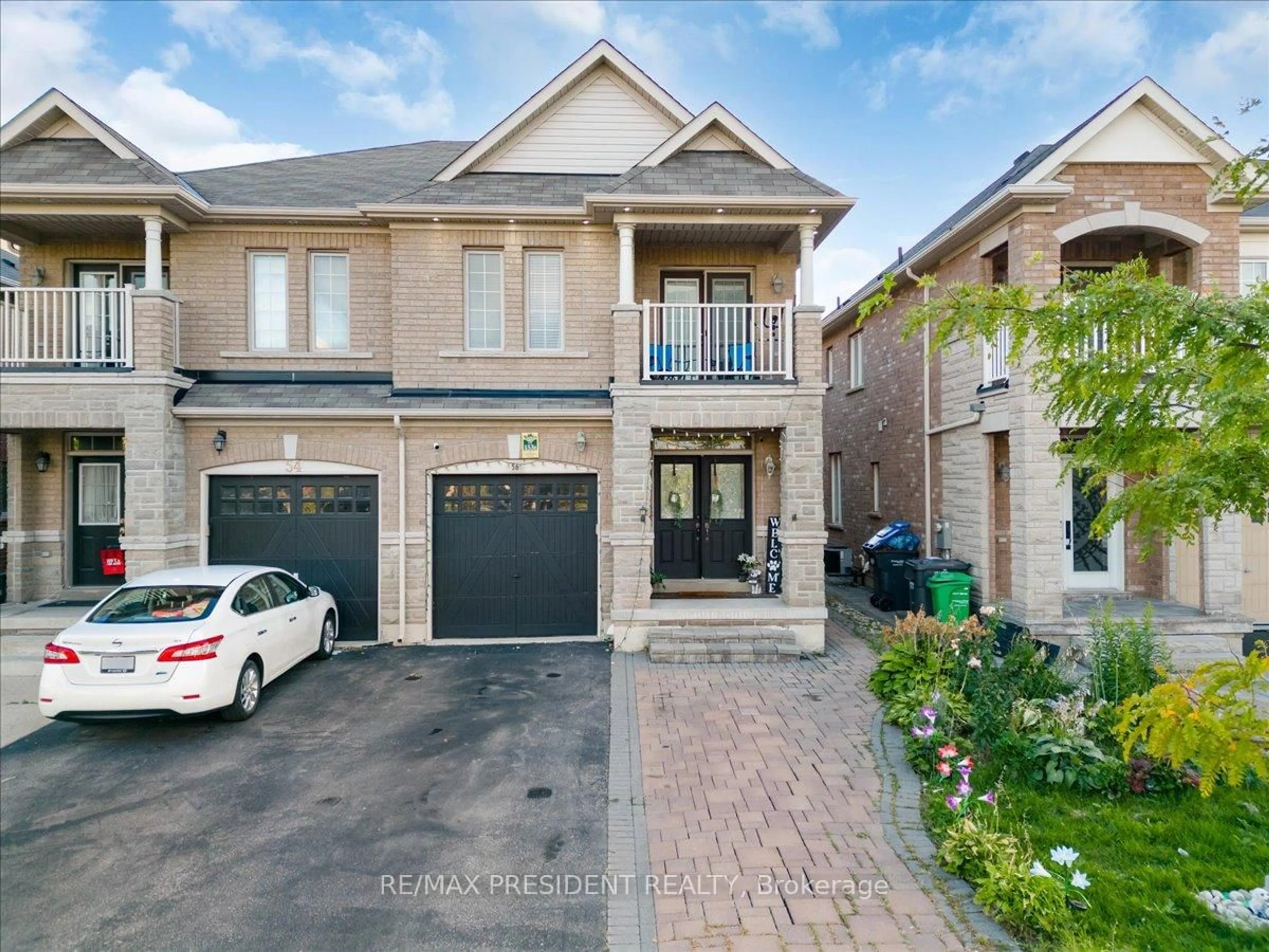 Home with brick exterior material, street for 56 Natronia Tr, Brampton Ontario L6P 3N8