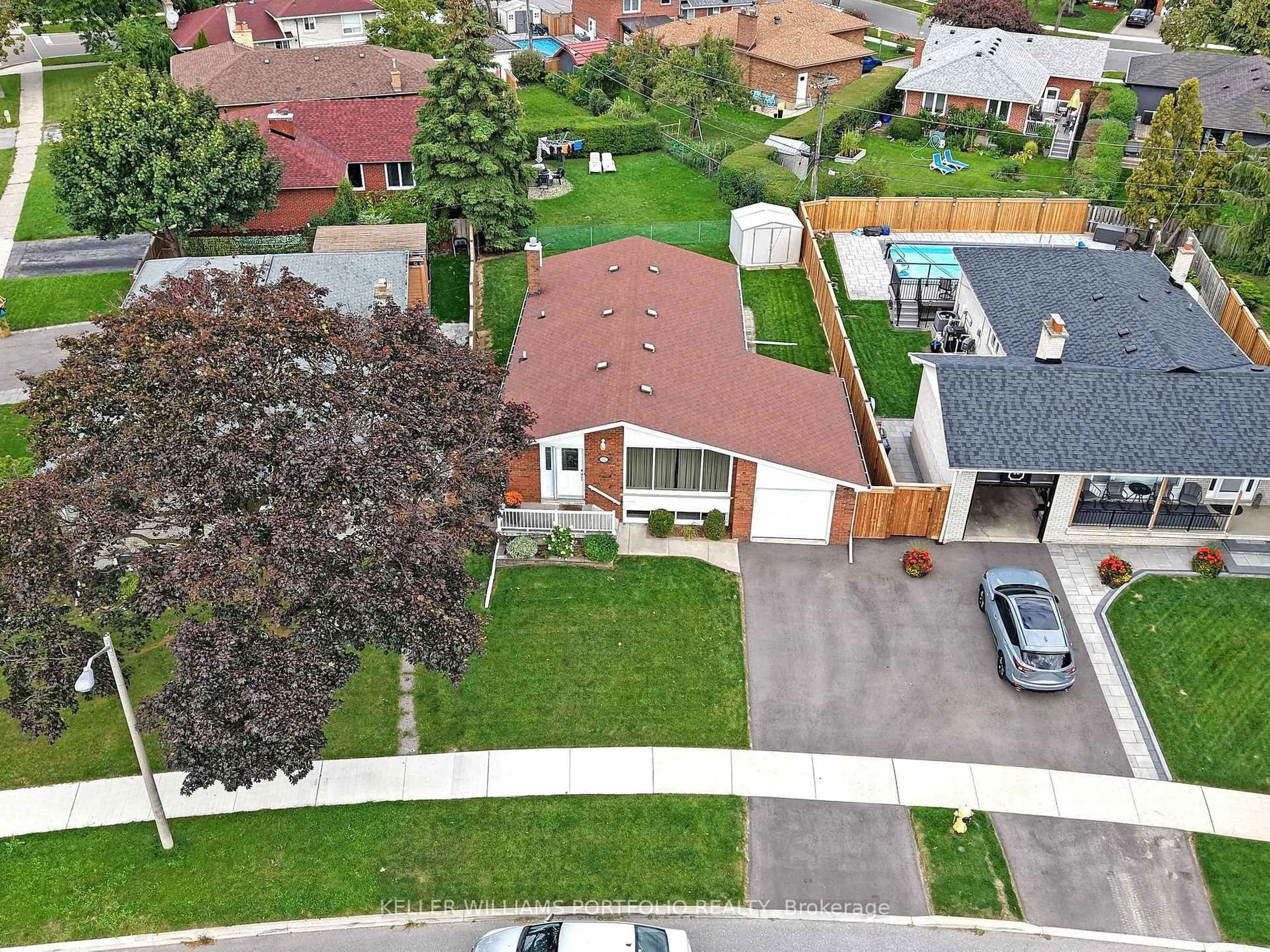 A pic from outside/outdoor area/front of a property/back of a property/a pic from drone, street for 50 Dixfield Dr, Toronto Ontario M9C 4J3