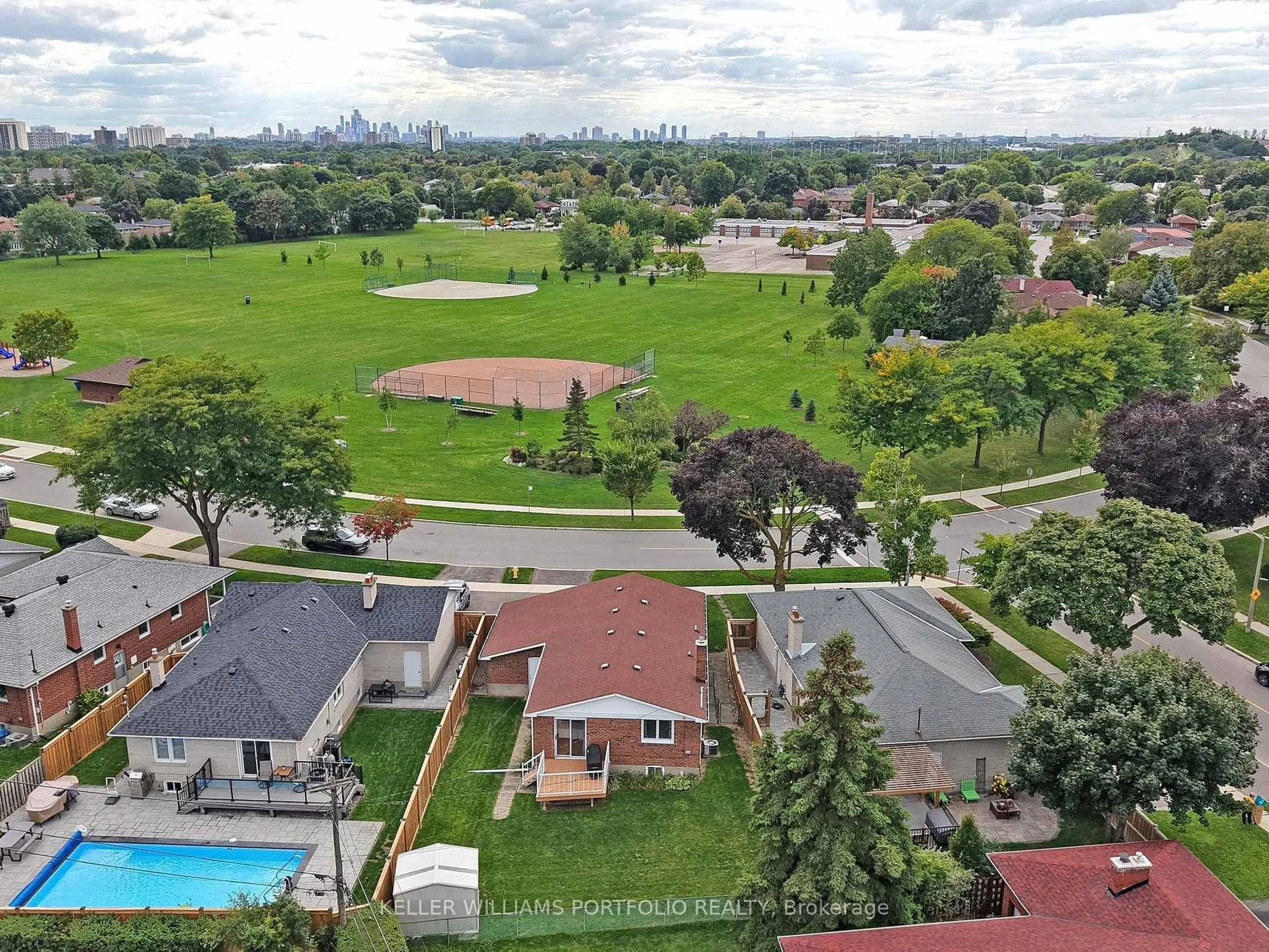 A pic from outside/outdoor area/front of a property/back of a property/a pic from drone, city buildings view from balcony for 50 Dixfield Dr, Toronto Ontario M9C 4J3