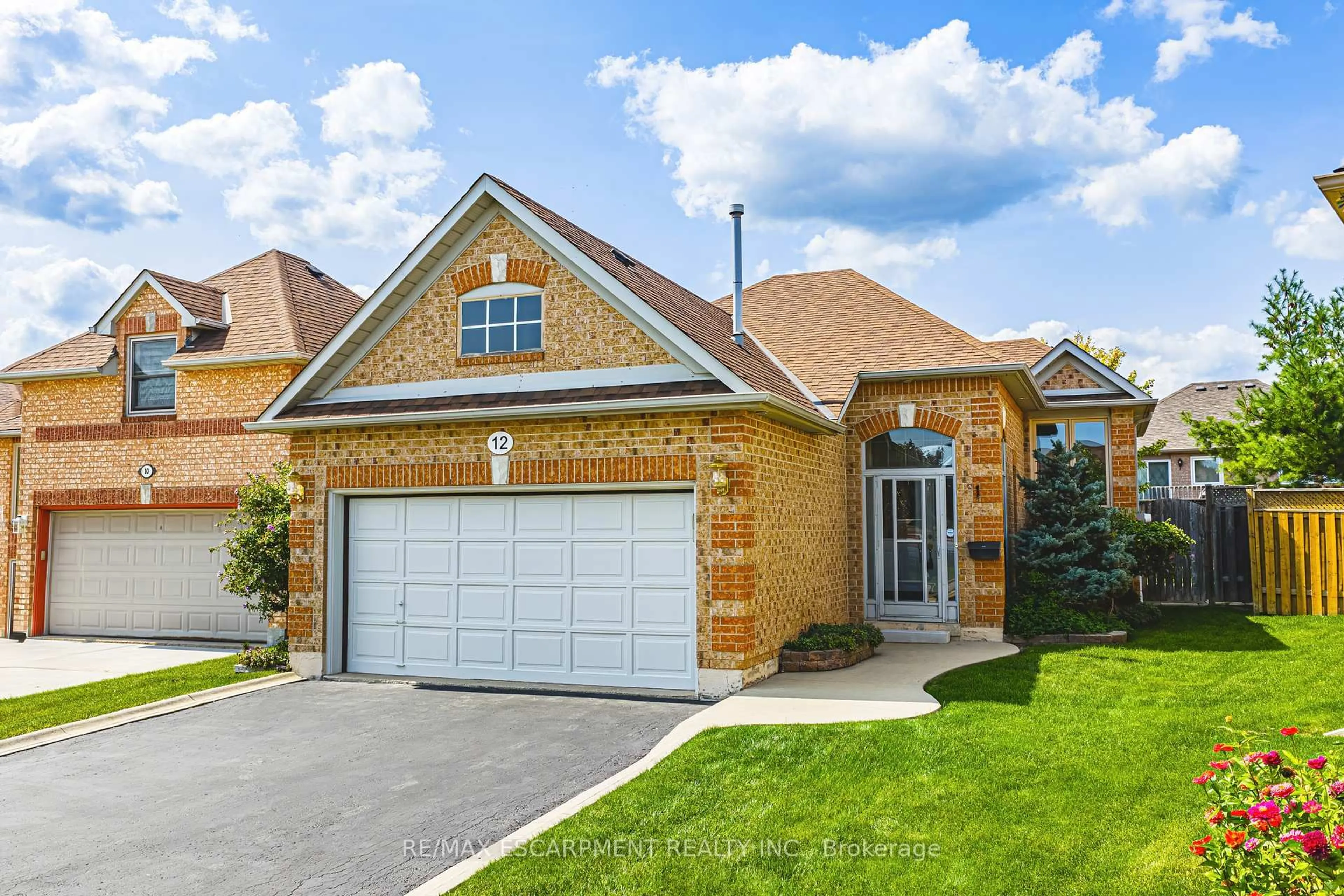Home with brick exterior material, street for 12 Summerfield Cres, Brampton Ontario L6X 4L3