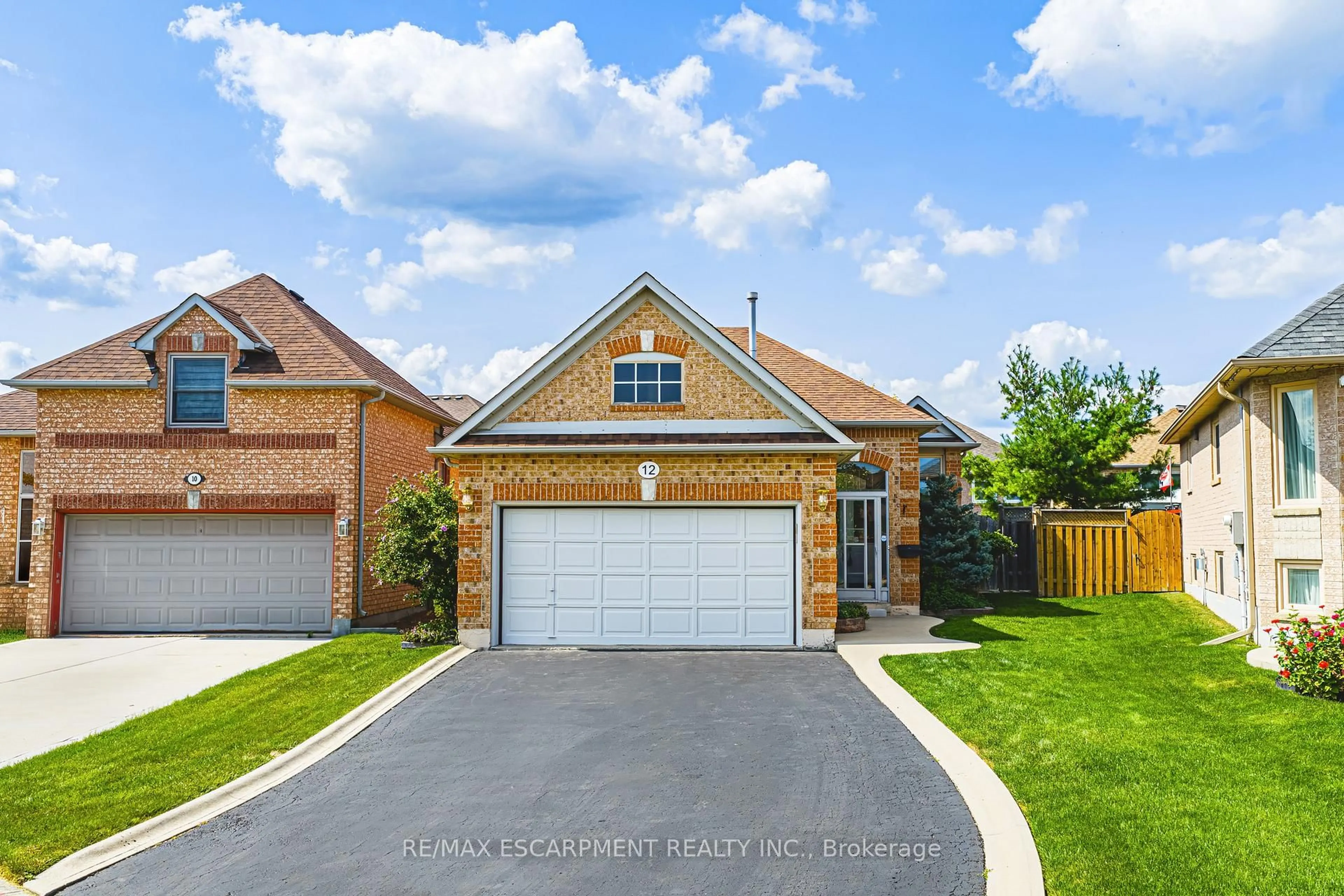 Home with brick exterior material, street for 12 Summerfield Cres, Brampton Ontario L6X 4L3