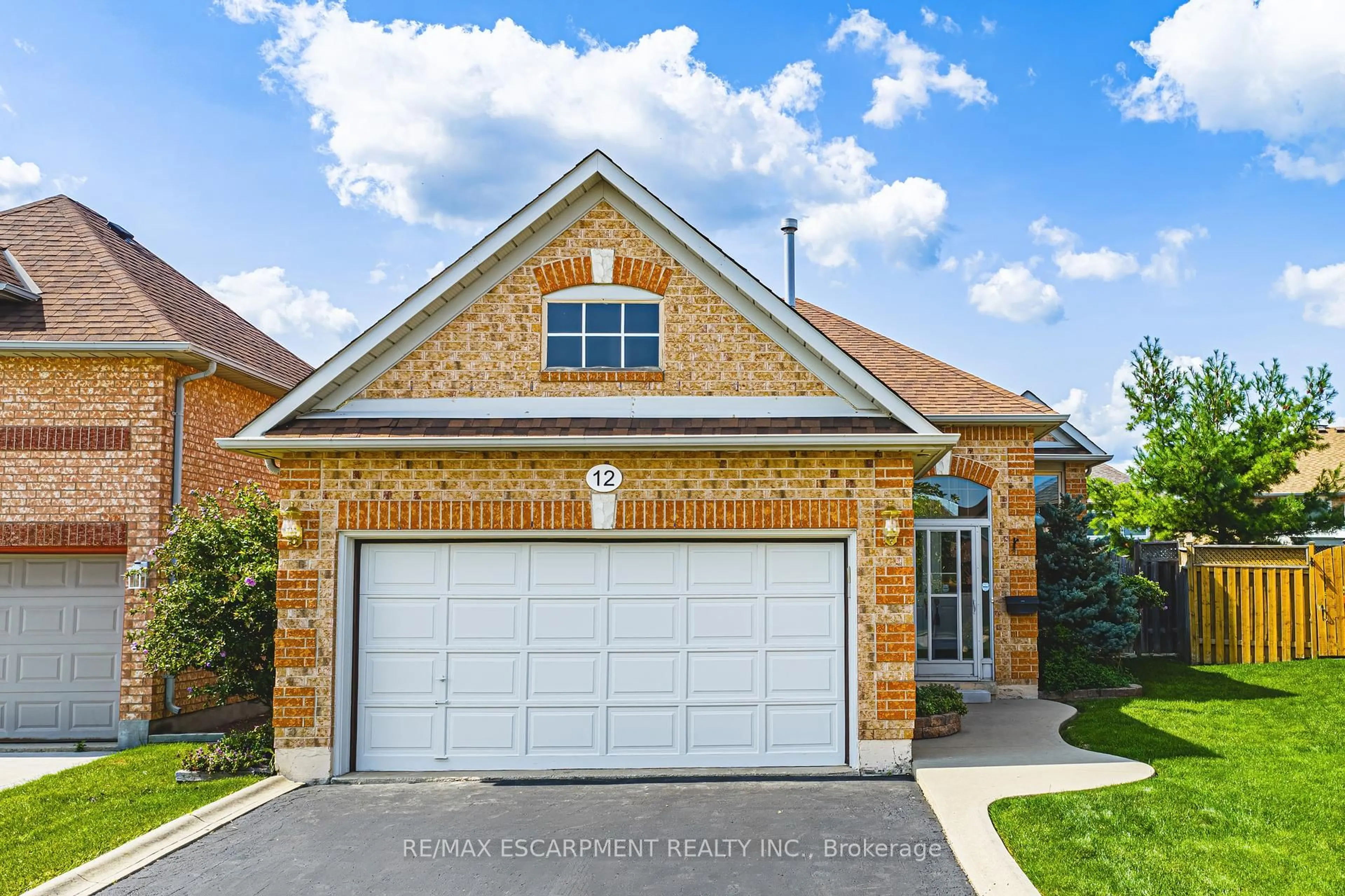 Home with brick exterior material, street for 12 Summerfield Cres, Brampton Ontario L6X 4L3