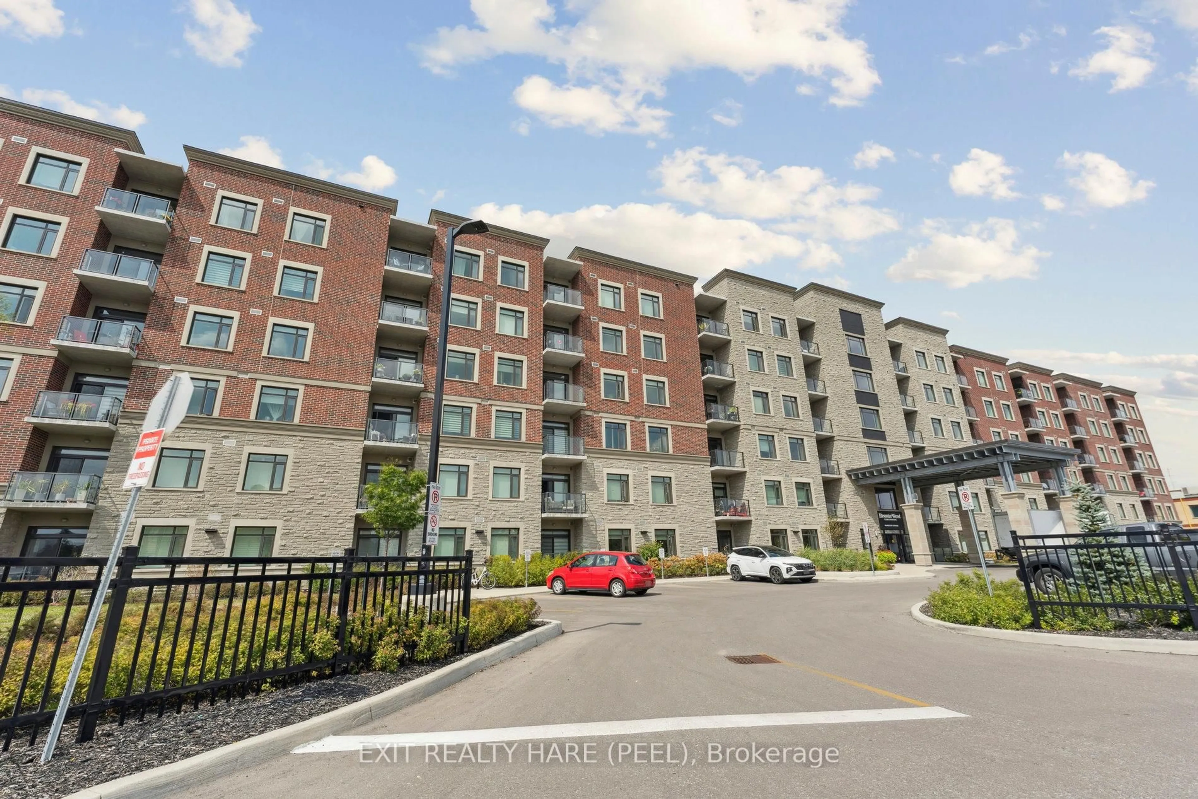 A pic from outside/outdoor area/front of a property/back of a property/a pic from drone, street for 830 Megson Terr #223, Milton Ontario L9T 9M7