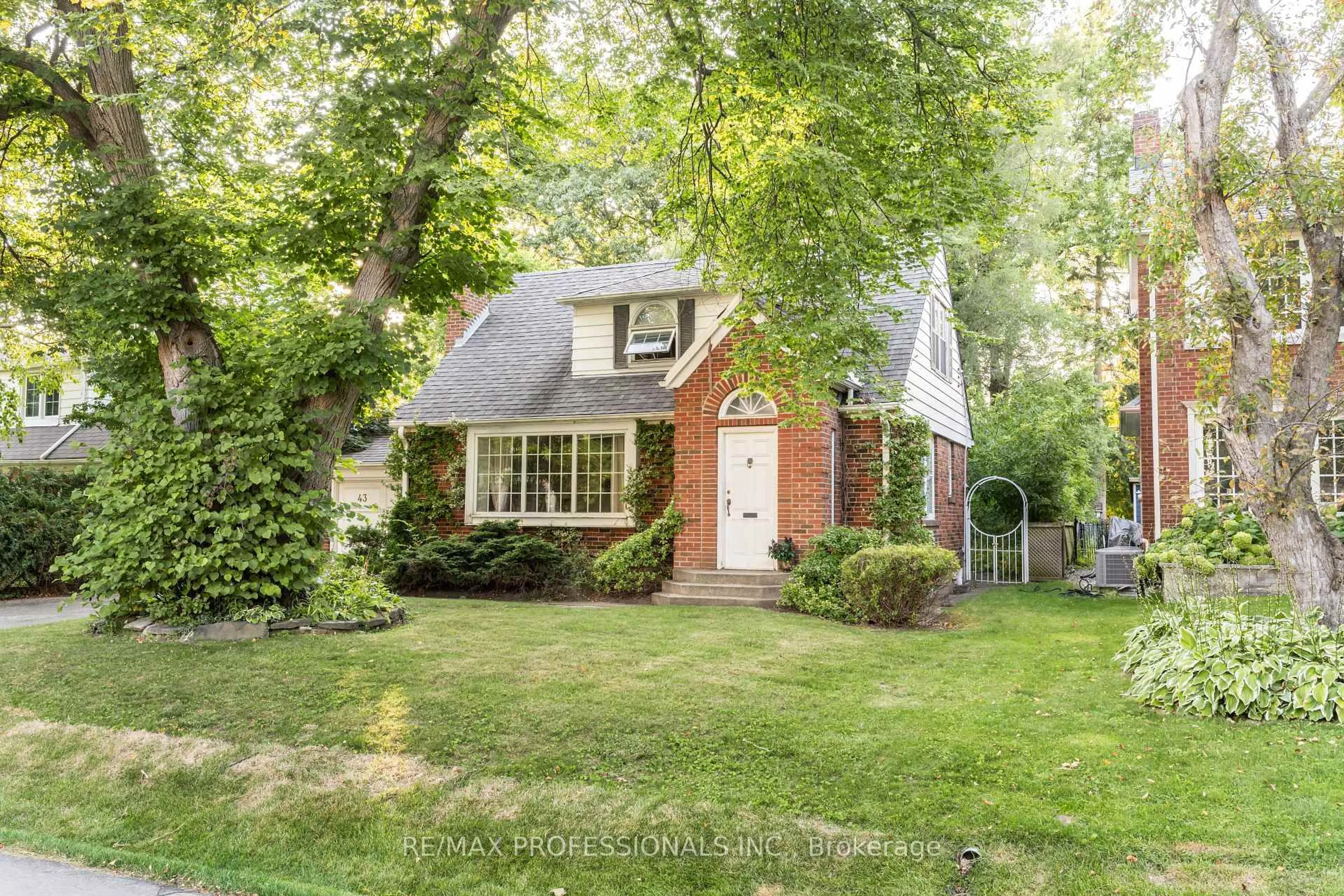 Home with brick exterior material, street for 43 Nottingham Dr, Toronto Ontario M9A 2W4