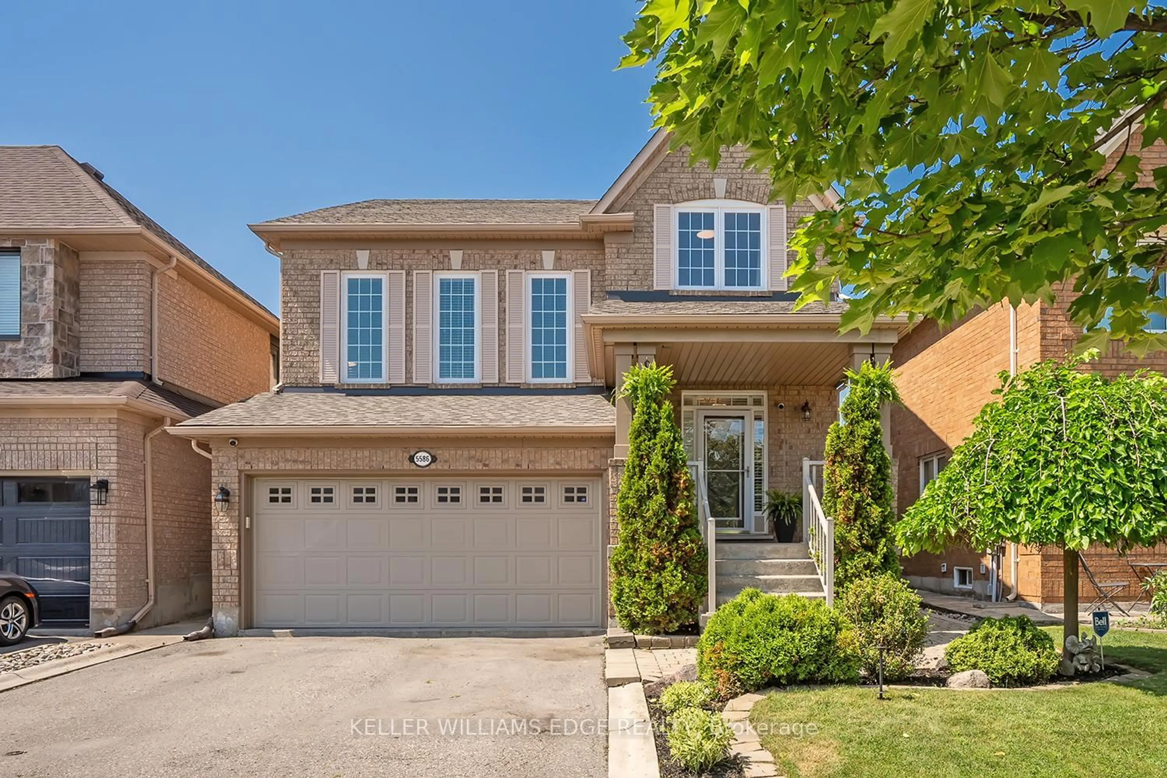 Home with brick exterior material, street for 5586 Churchill Meadows Blvd, Mississauga Ontario L5M 6M6