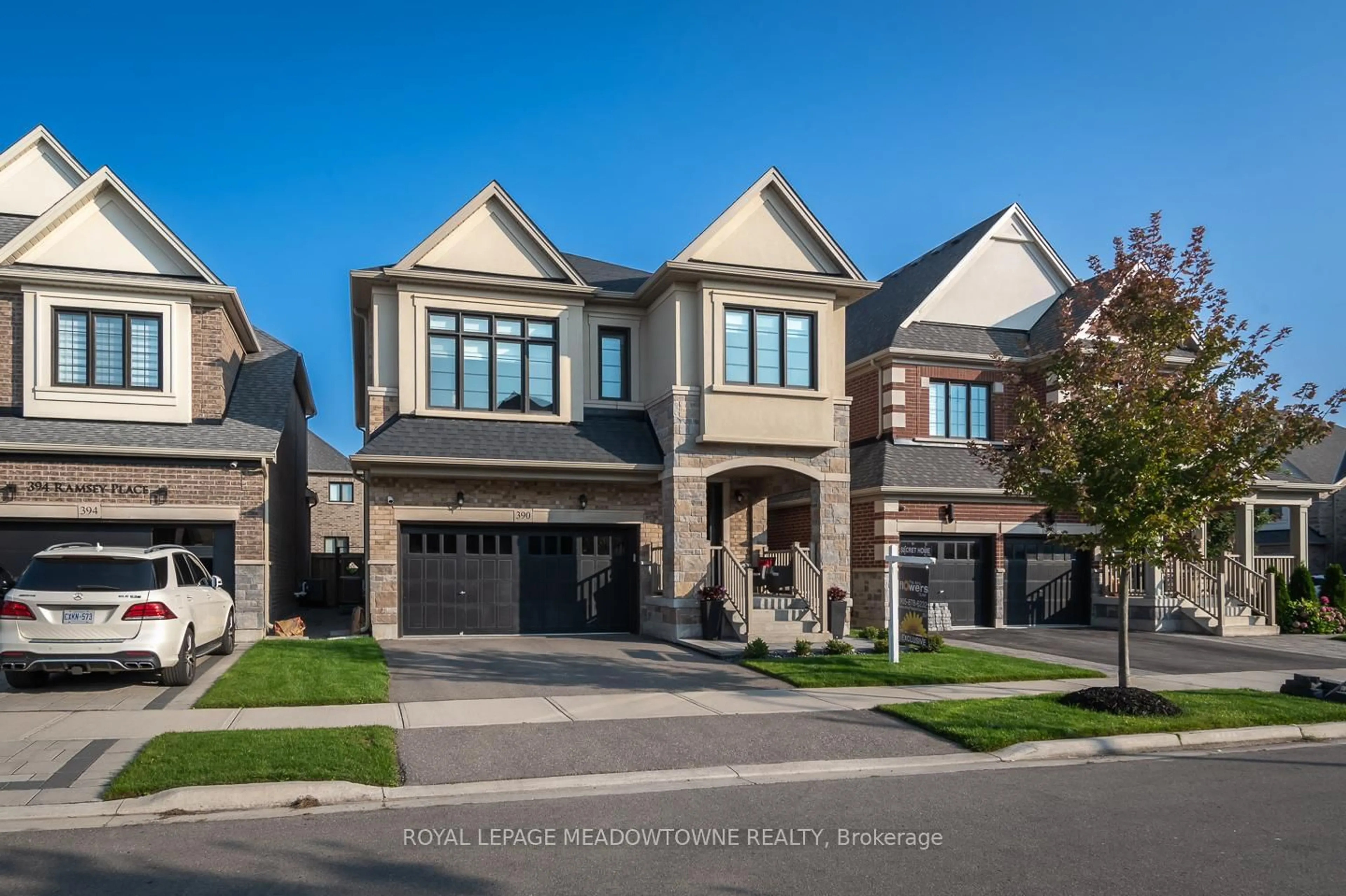 Home with brick exterior material, street for 390 Ramsey Pl, Milton Ontario L9E 1N3