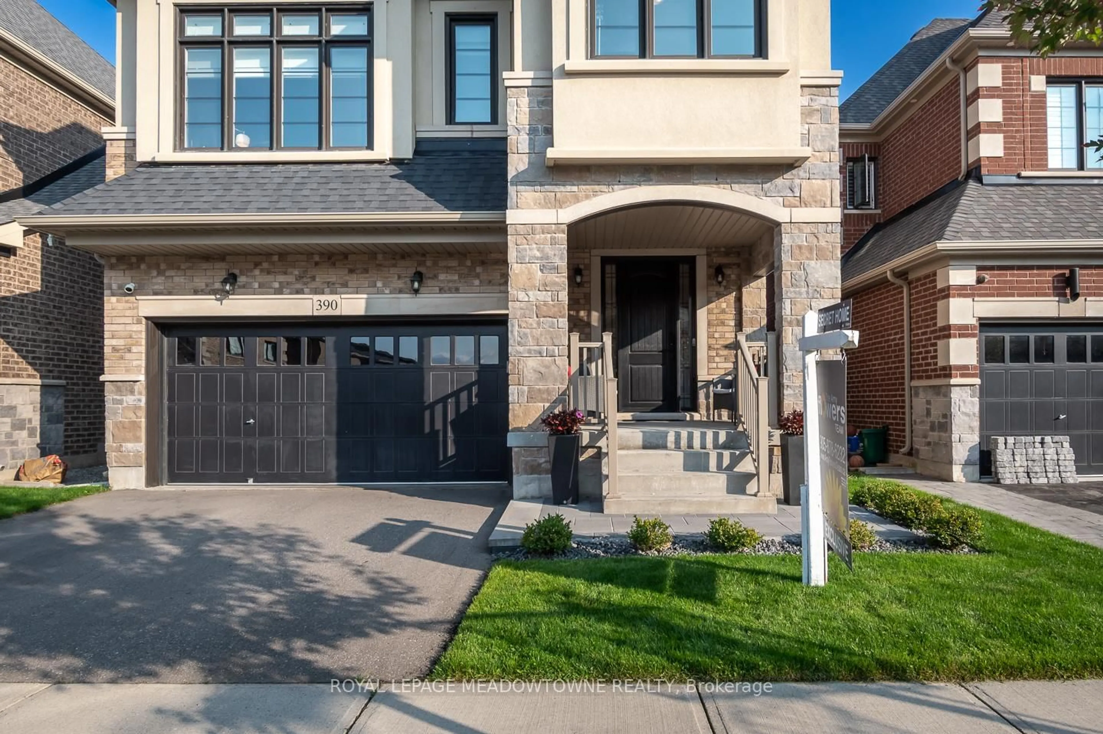 Home with brick exterior material, street for 390 Ramsey Pl, Milton Ontario L9E 1N3