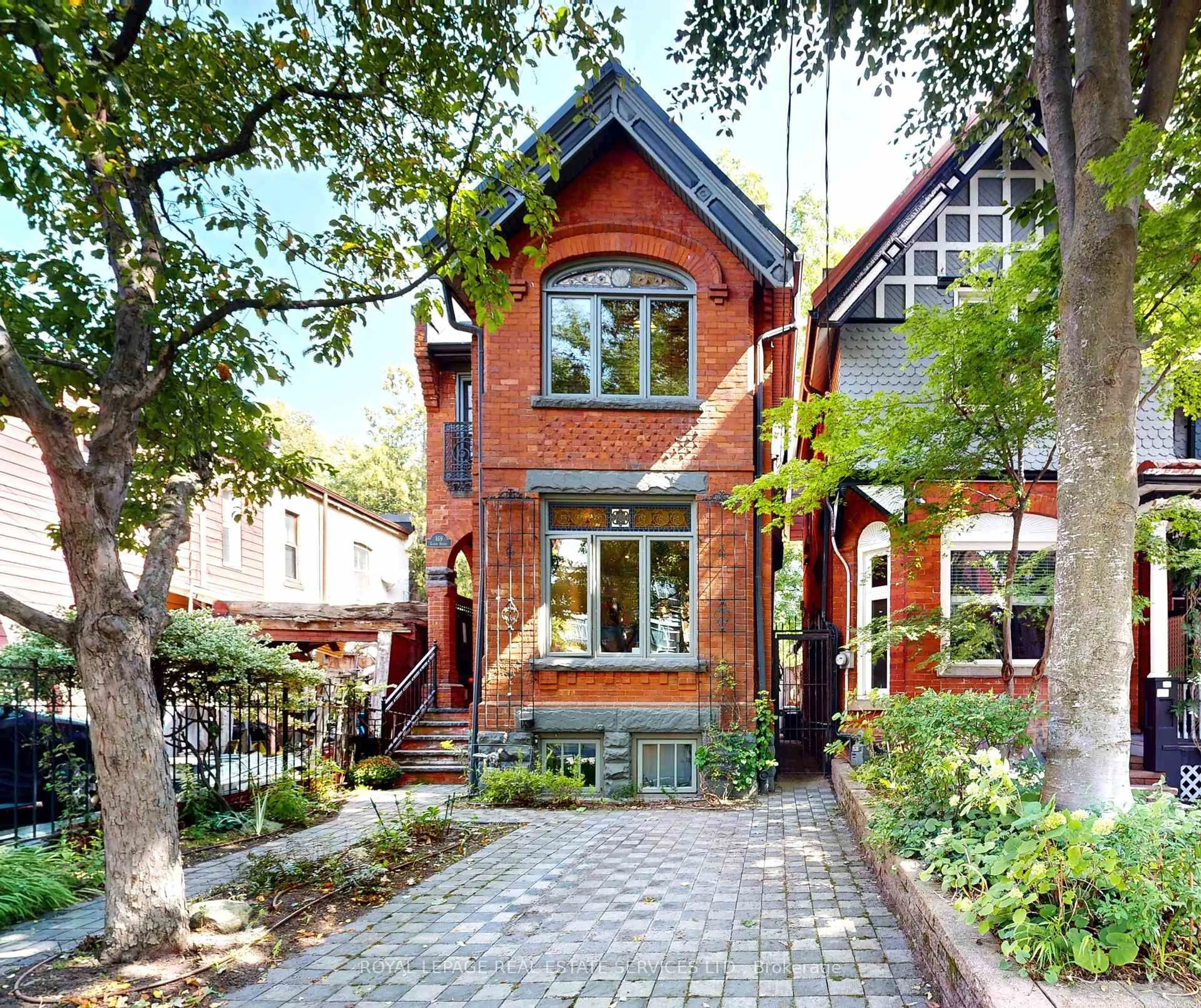 Home with brick exterior material, street for 169 Cowan Ave, Toronto Ontario M6K 2N5