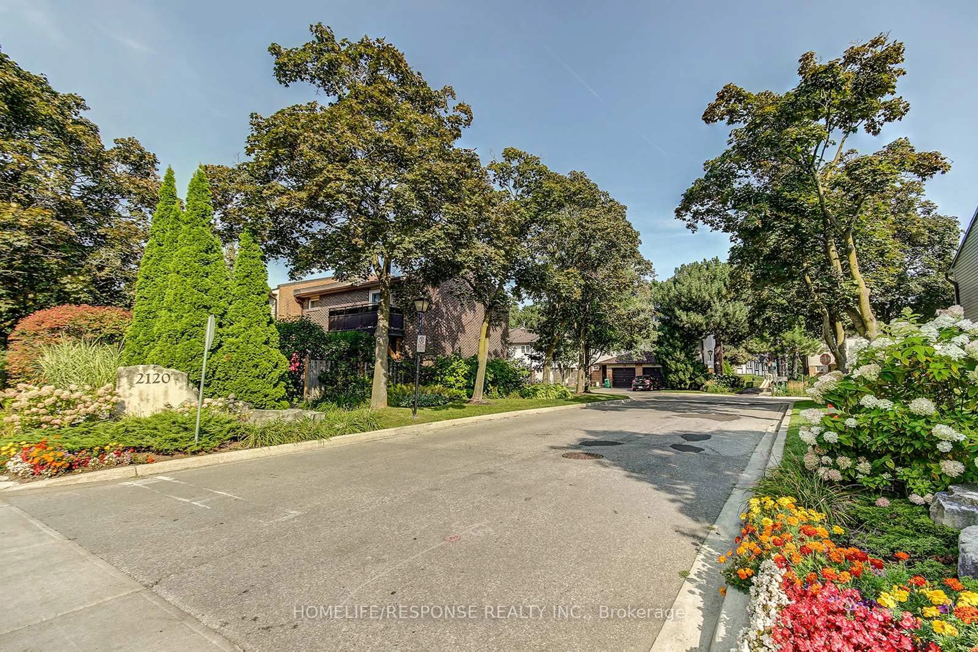 A pic from outside/outdoor area/front of a property/back of a property/a pic from drone, street for 2120 Rathburn Rd #134, Mississauga Ontario L4W 2S8