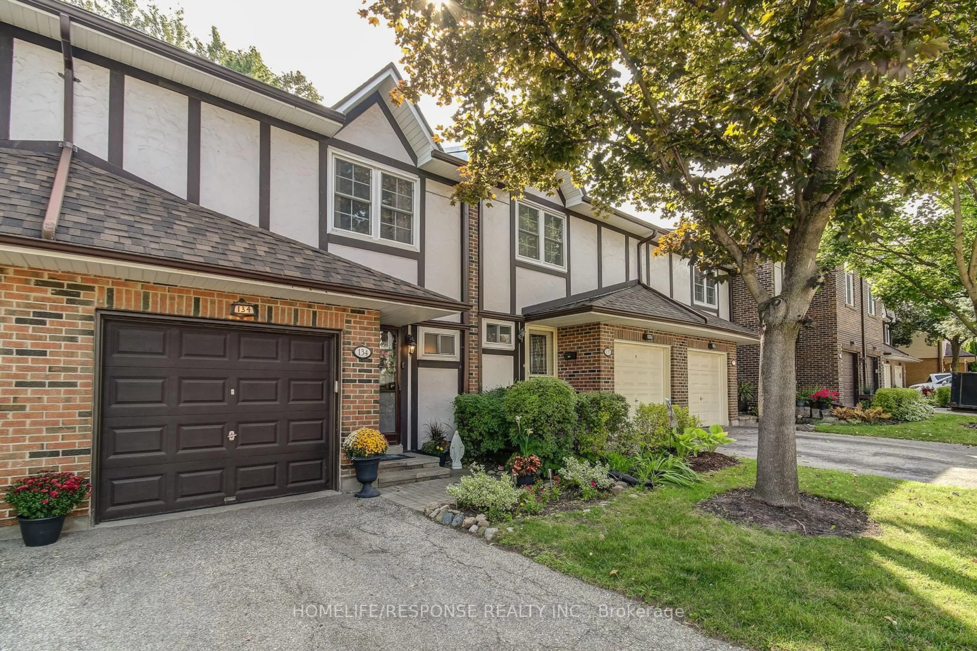 Home with brick exterior material, street for 2120 Rathburn Rd #134, Mississauga Ontario L4W 2S8
