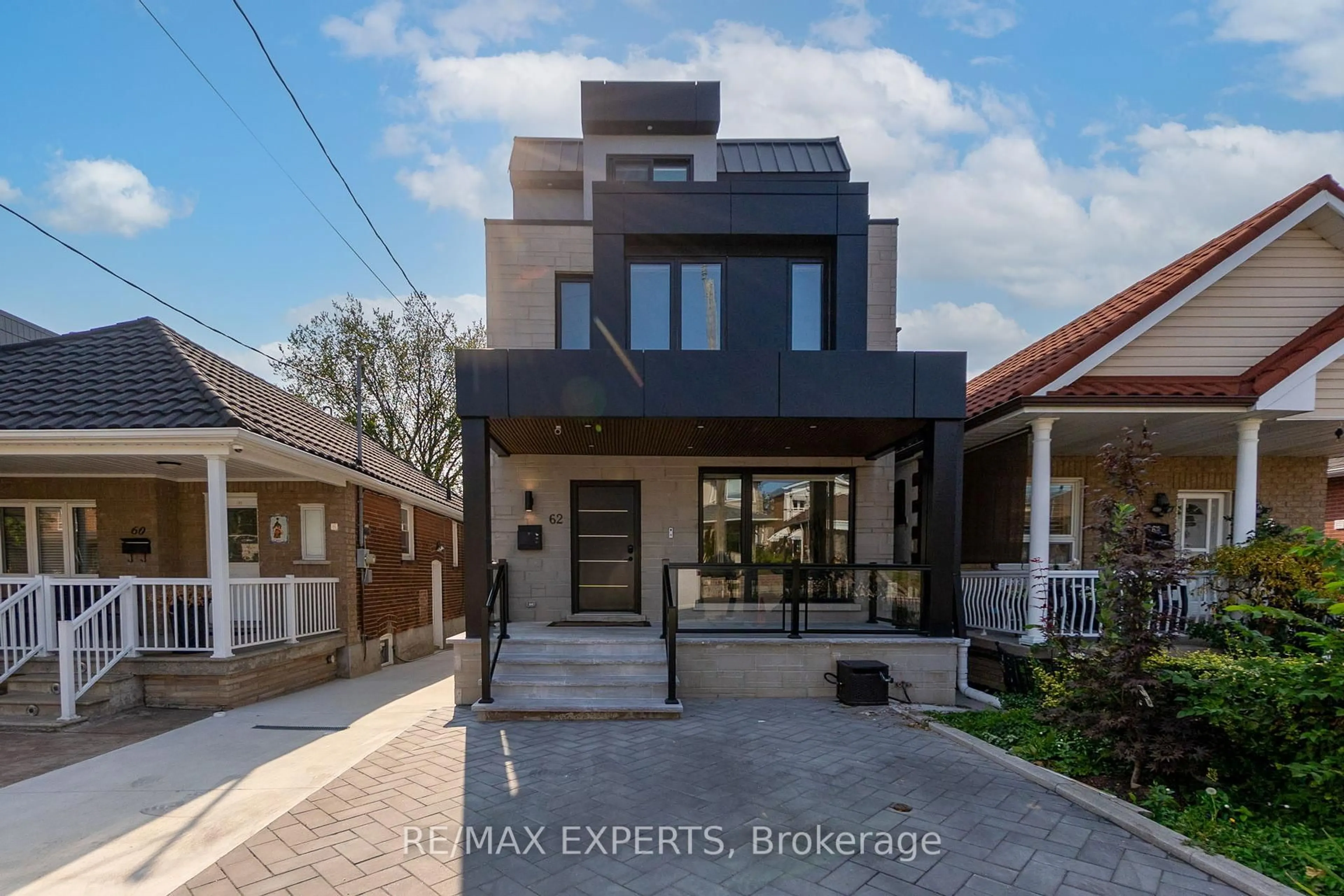 Home with brick exterior material, street for 62 Hartley Ave, Toronto Ontario M6E 4E8