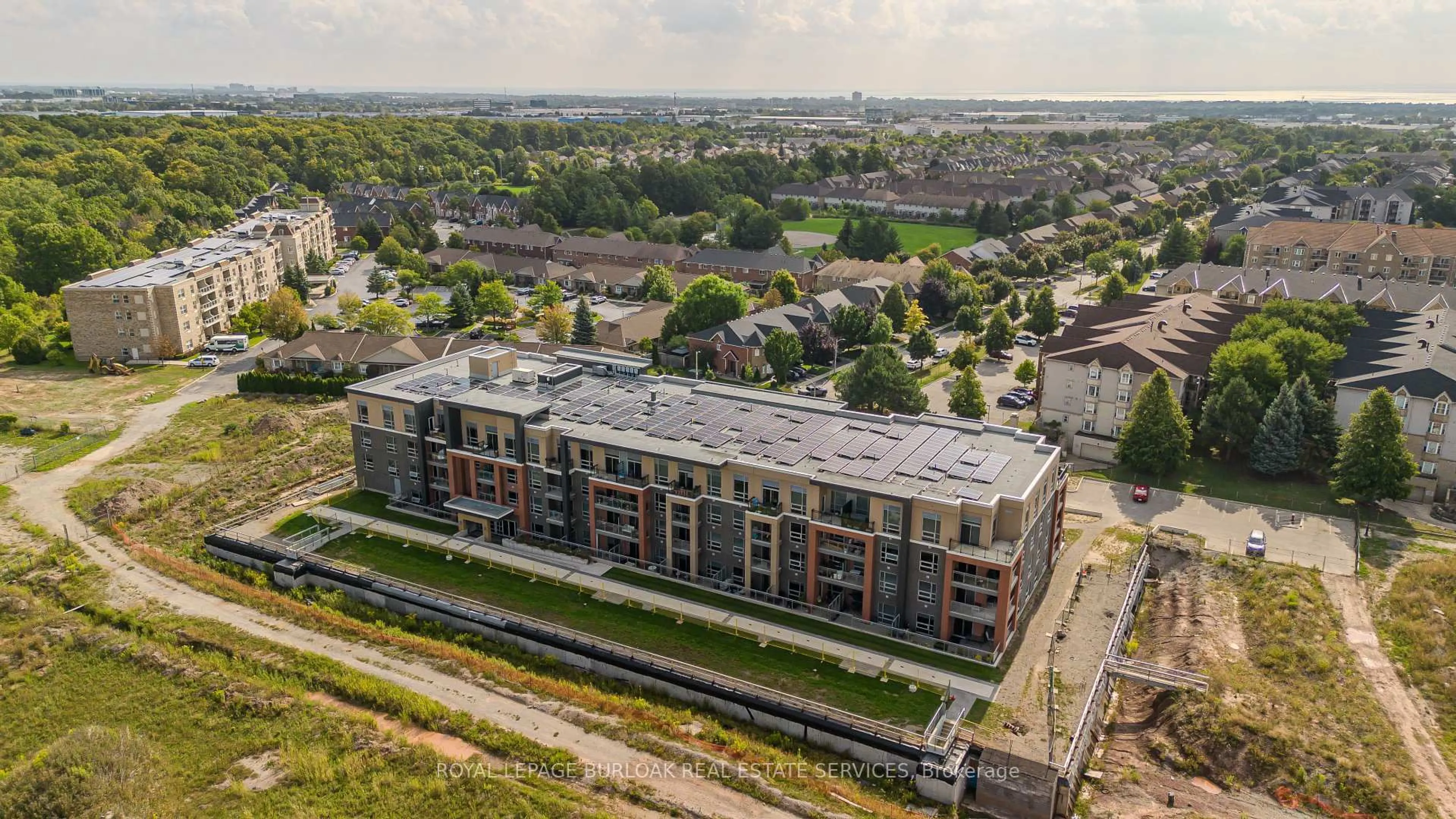 A pic from outside/outdoor area/front of a property/back of a property/a pic from drone, city buildings view from balcony for 4040 Upper Middle Rd #117, Burlington Ontario L7M 0H2