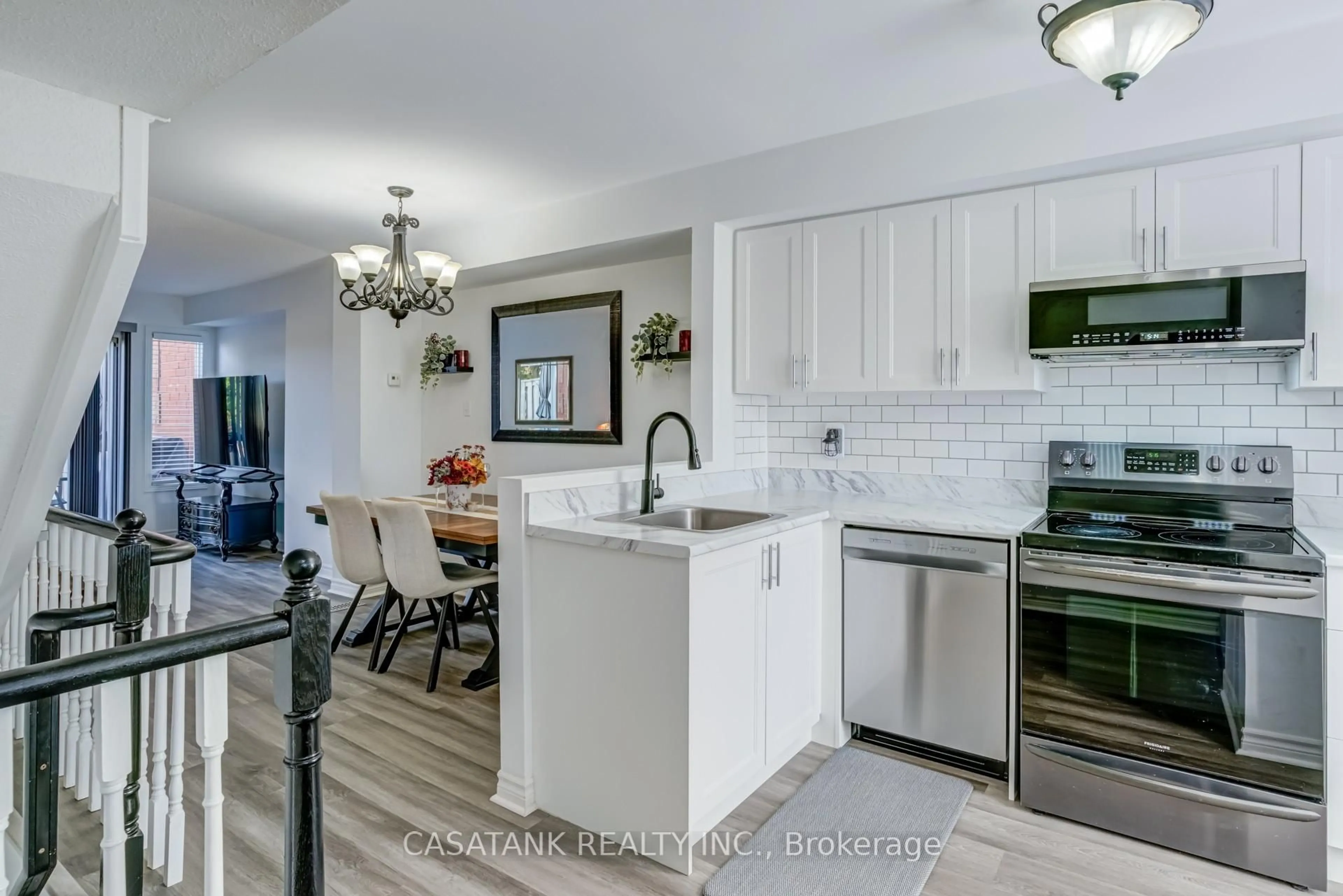 Open concept kitchen, ceramic/tile floor for 3895 Doug Leavens Blvd #10, Mississauga Ontario L5N 7G1