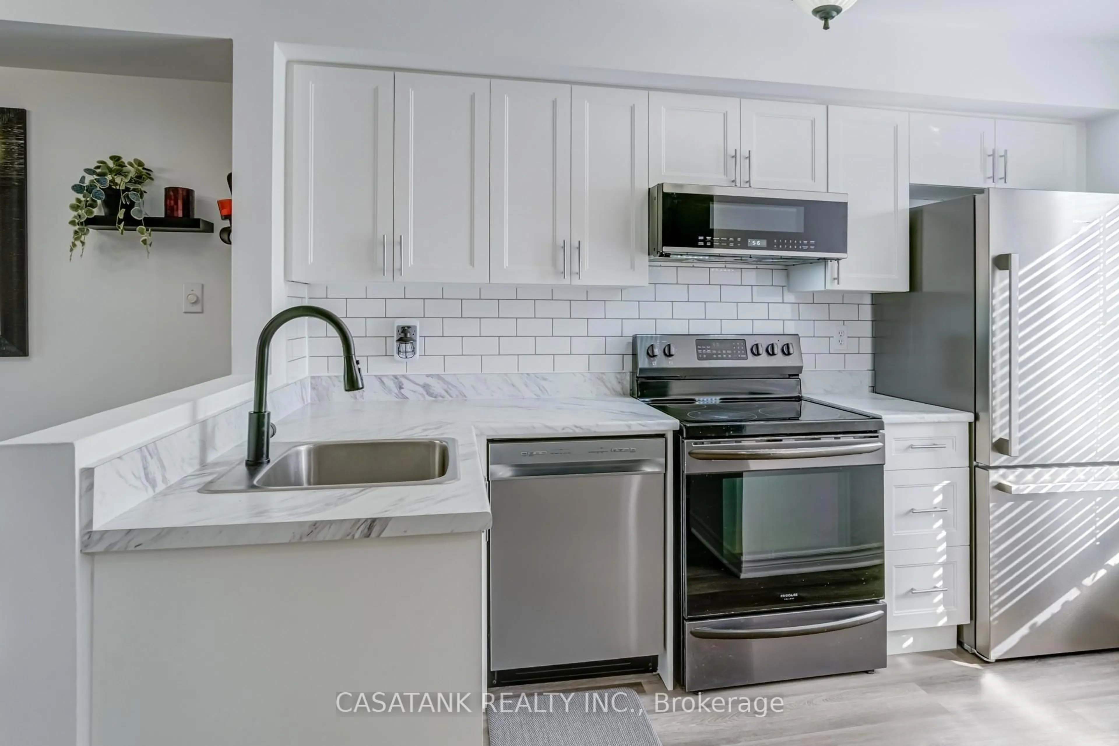 Standard kitchen, ceramic/tile floor for 3895 Doug Leavens Blvd #10, Mississauga Ontario L5N 7G1